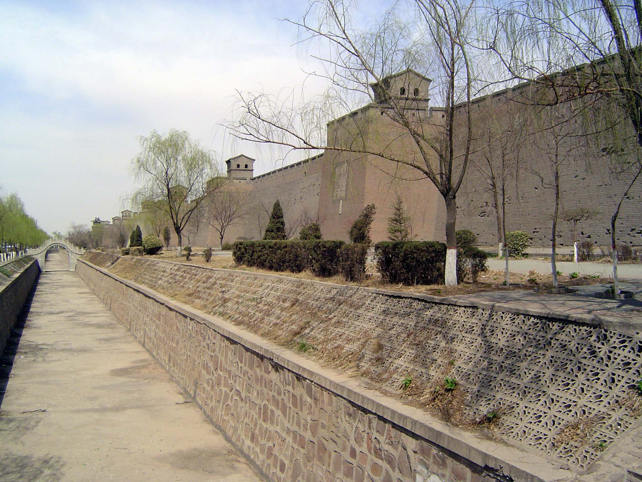 Pingyao has been a UNESCO World Heritage site since 1997, but its luck began 20 years earlier, when the city wall protected the urban core f