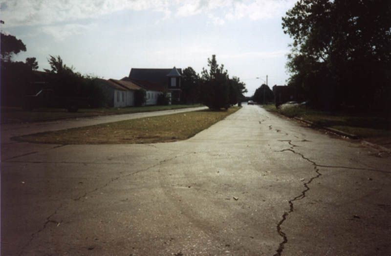 The main residential avenue of Waurika Jefferson County, population 2,000. The Union Pacific Railway comes through, and this avenue runs per