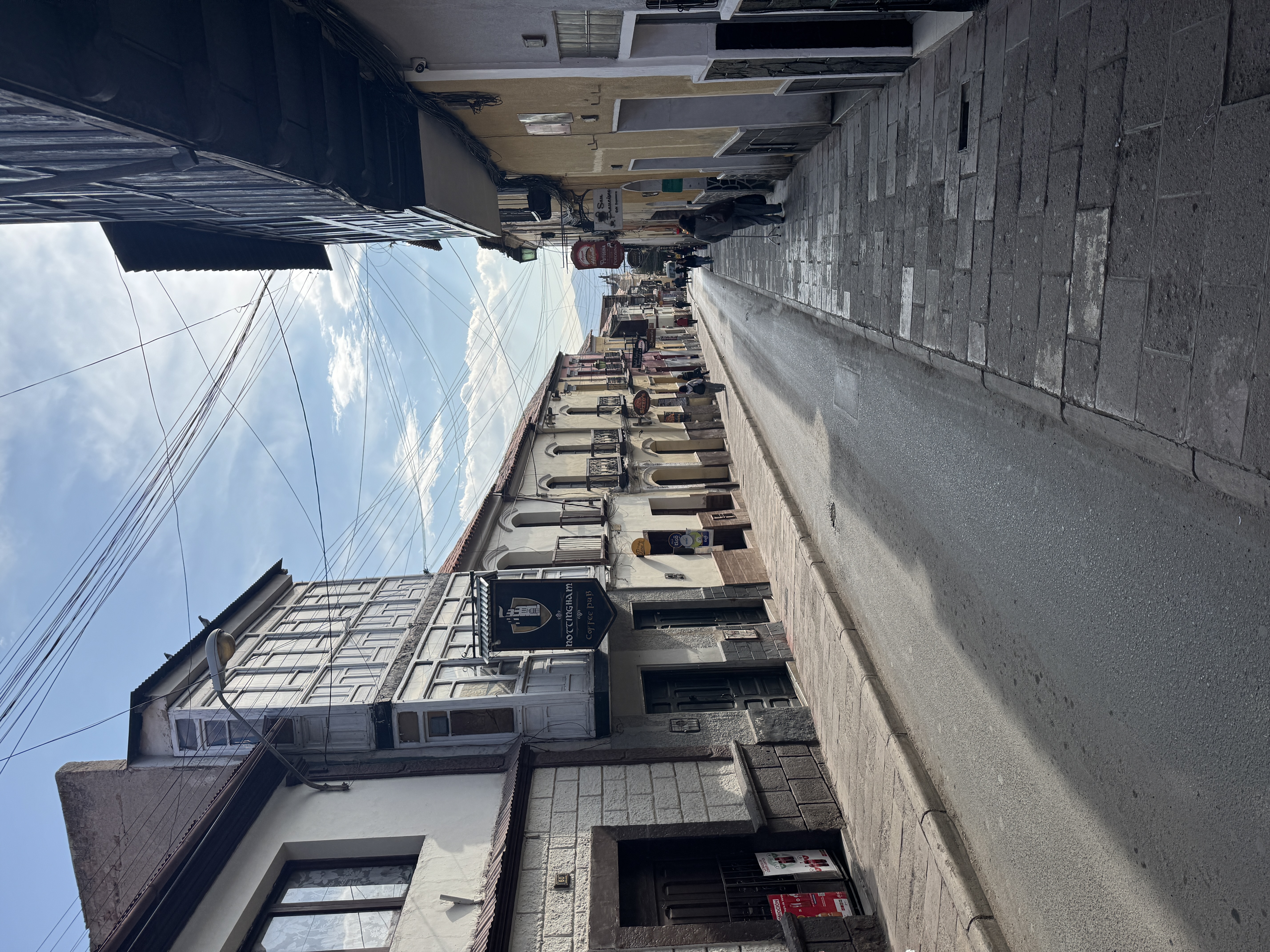 A street seems traditional until you read the sign.  On the other hand, foreigners living in Potosi in the 19th went crazy from boredom.  Co