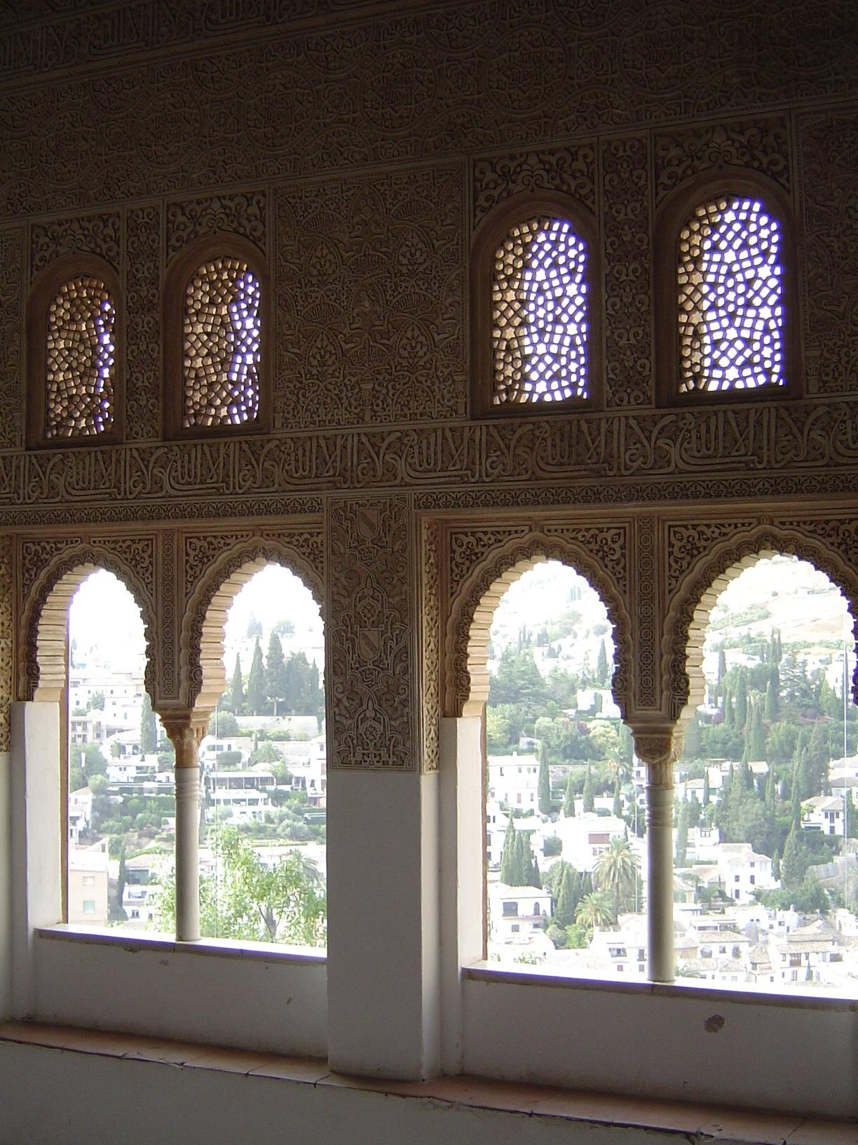 The windows of the oratory look across to Albaicin. The jalis or tracery screens help cut the brightness of the summer sun.