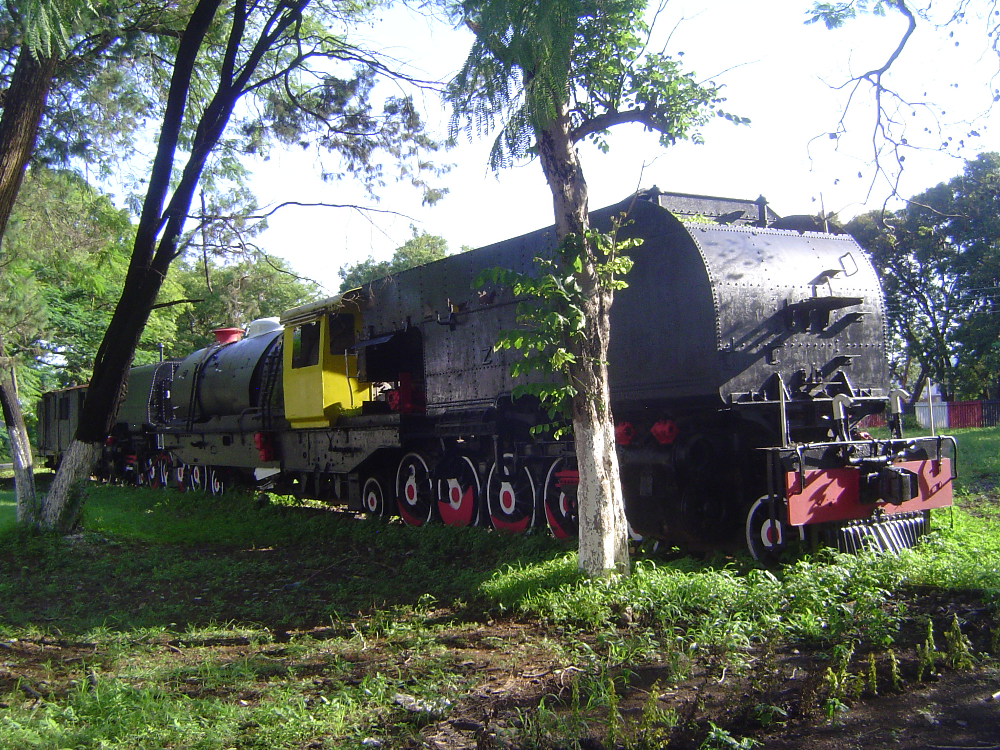 There was almost no town before the railroad, one of whose Garratt engines is parked across from the station. The boiler of the Garratts is