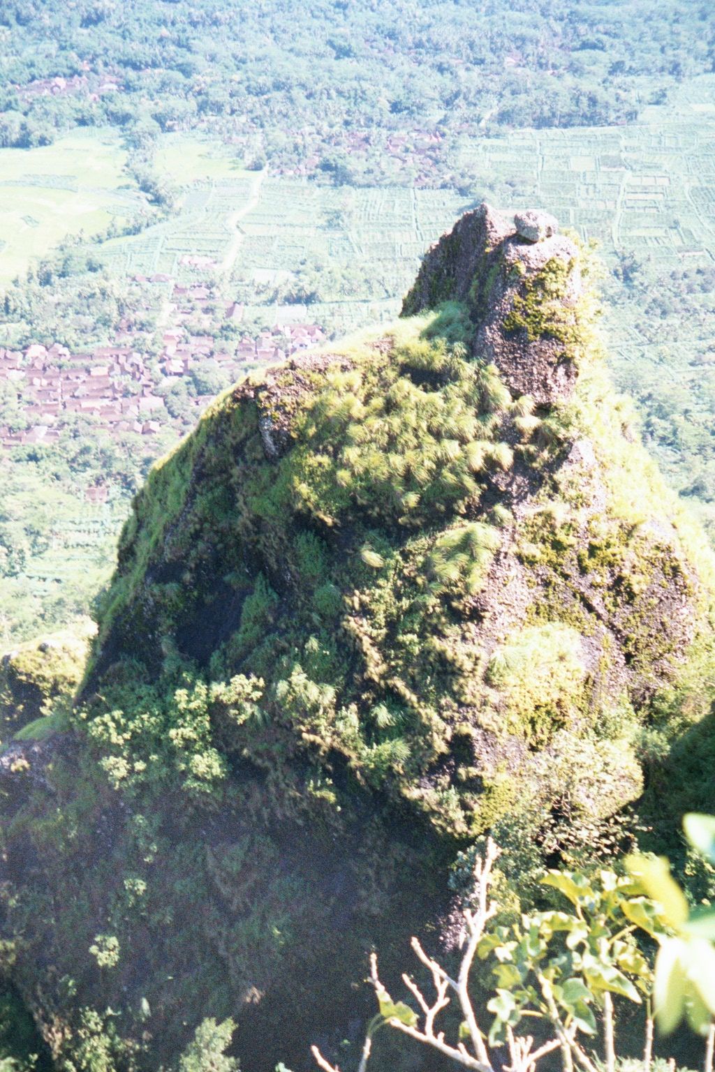 From the top, a view of the "bump" seen earlier. Down below, paddy lands and villages.