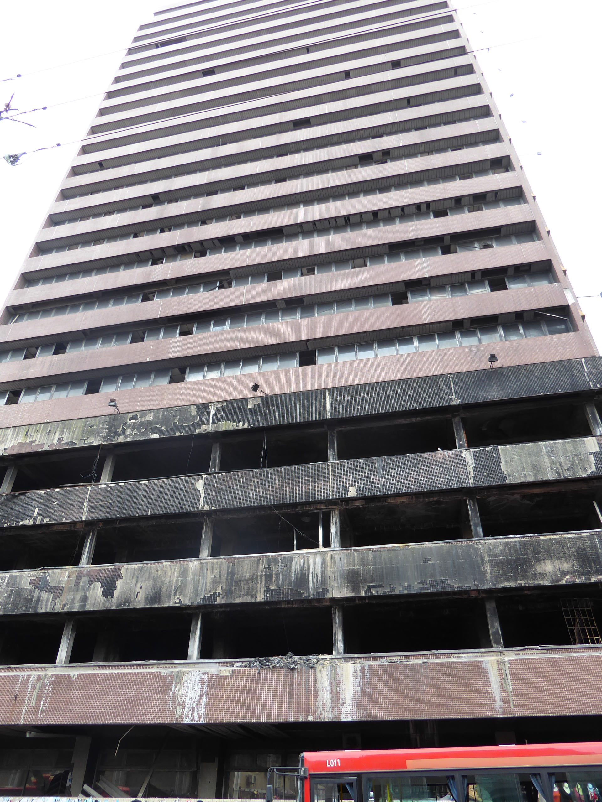 Many heavy-handed highrises were built, in this case on Martin Street across from the Shitta Bey mosque. It's Great Nigeria House, owned by