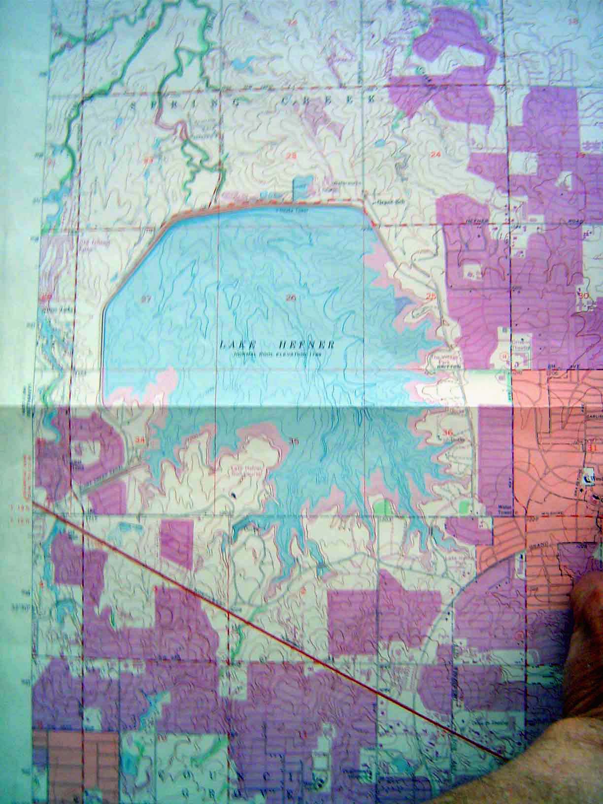 Here's the reservoir as shown on a USGS topo sheet which shows in dramatic purple the city's rapid growth. Lake Overholser is off to the low