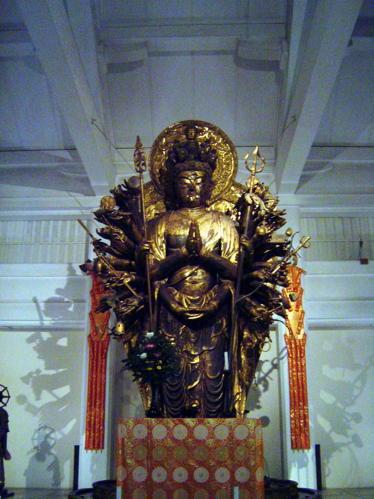 Senui-Kannon or 1000-armed Kannon, originally in the temple's dining hall. Kannon Sanskrit = Avalokiteshwara is one of the Amida Sanskrit =