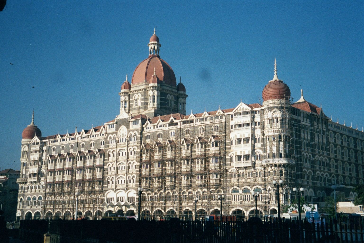 Across the street is the Taj Mahal Hotel, opened in 1903. For many years it was the crown jewel of the international Taj Hotels chain, a poi