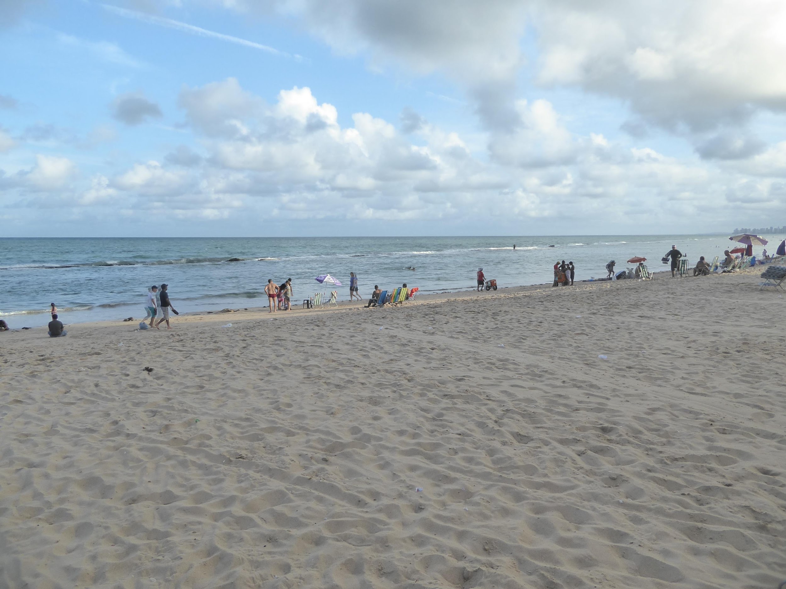 Lots of sand; better yet, there's a reef recife in Portuguese that calms the beach waves. The reef isn't coral, though; it's a sandstone fro