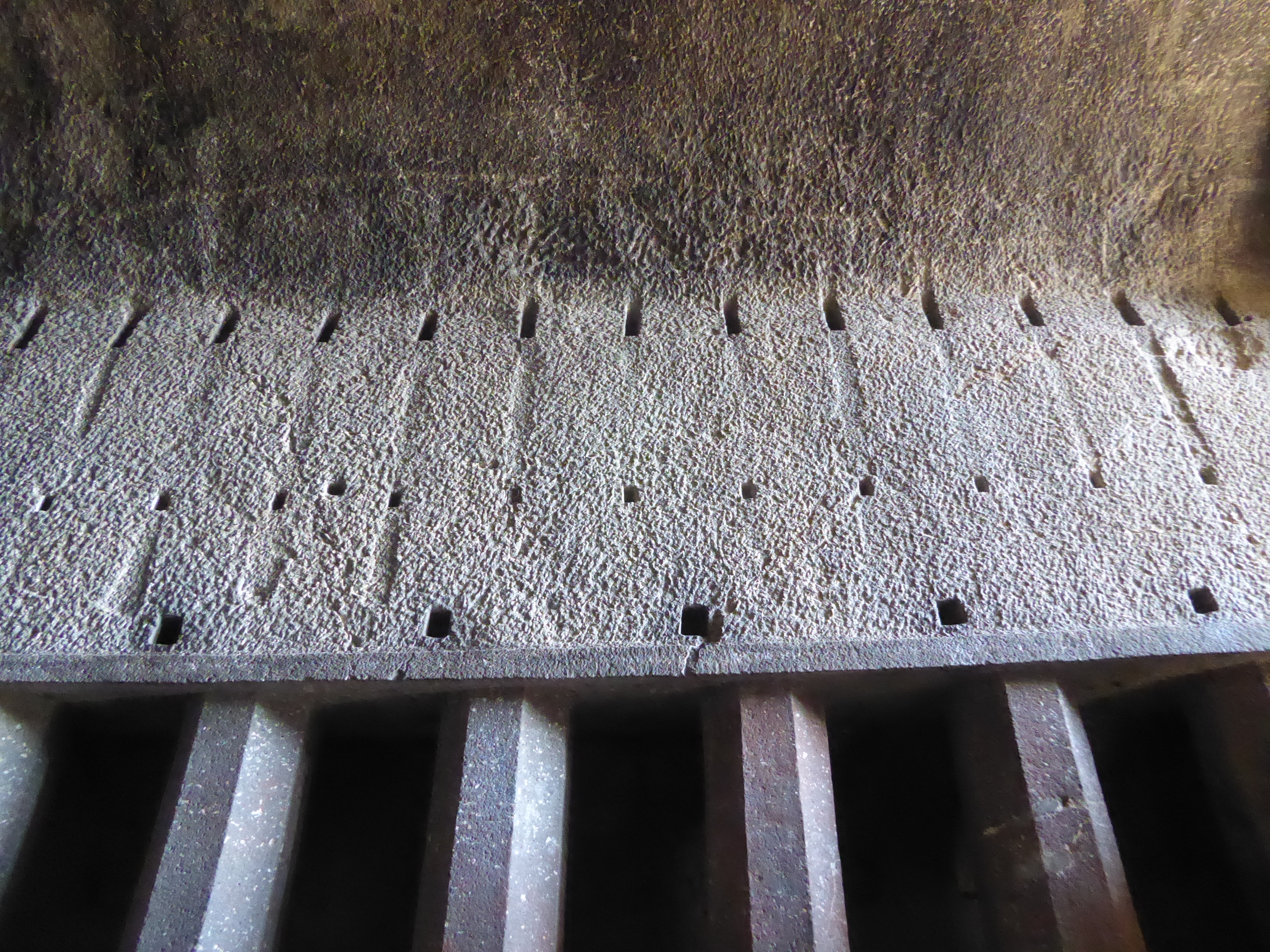 Mortices that once anchored timbers.