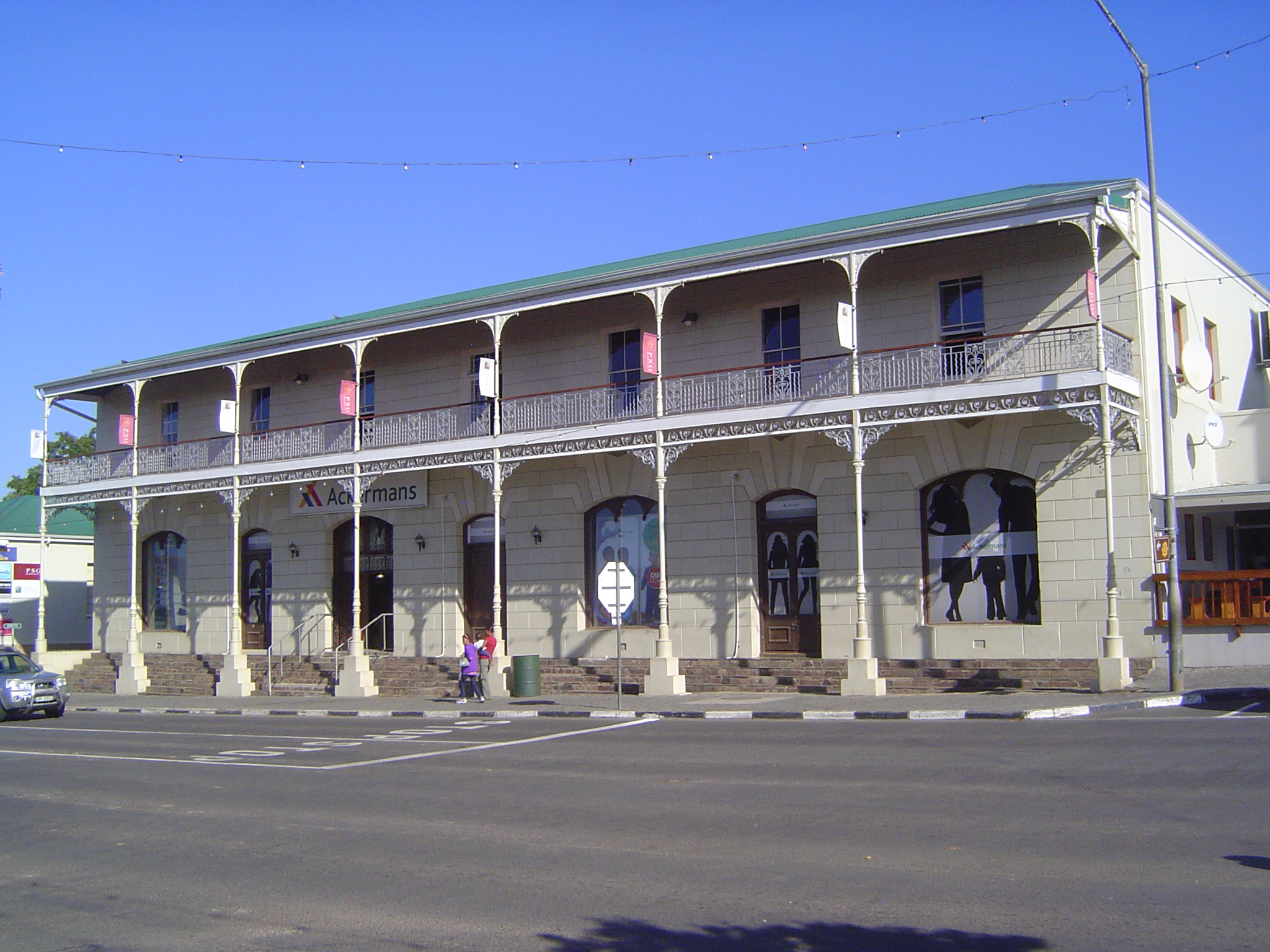 This building went up in the 1880s. Now it's a dry-goods chain store, but it was the Royal Hotel in 1930 and later became the Hotel Ten Damm