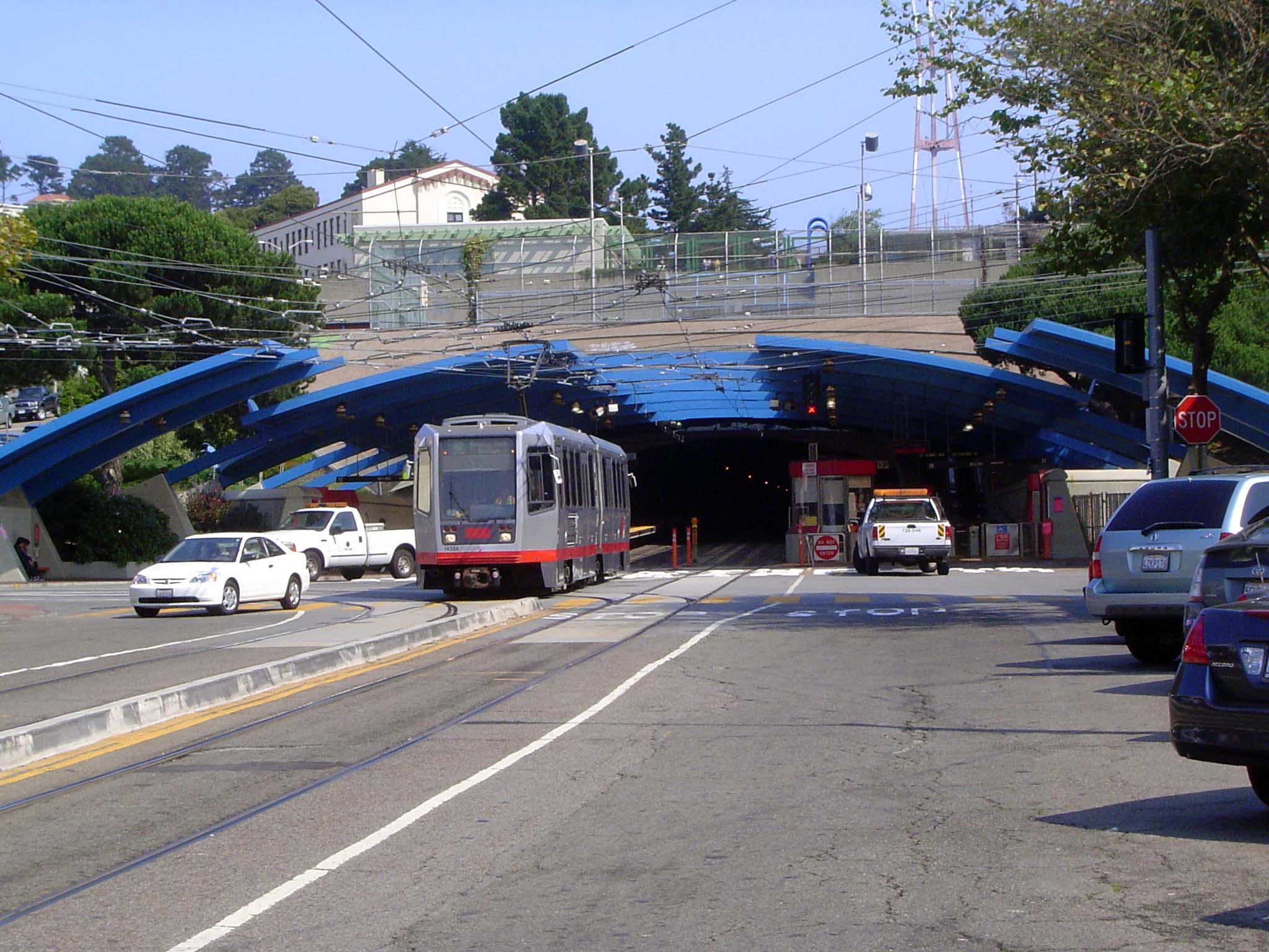 All these places were west of Twin Peaks and the tunnel under them. The boy often rode his bicycle downtown over a circuitous route—Alemany