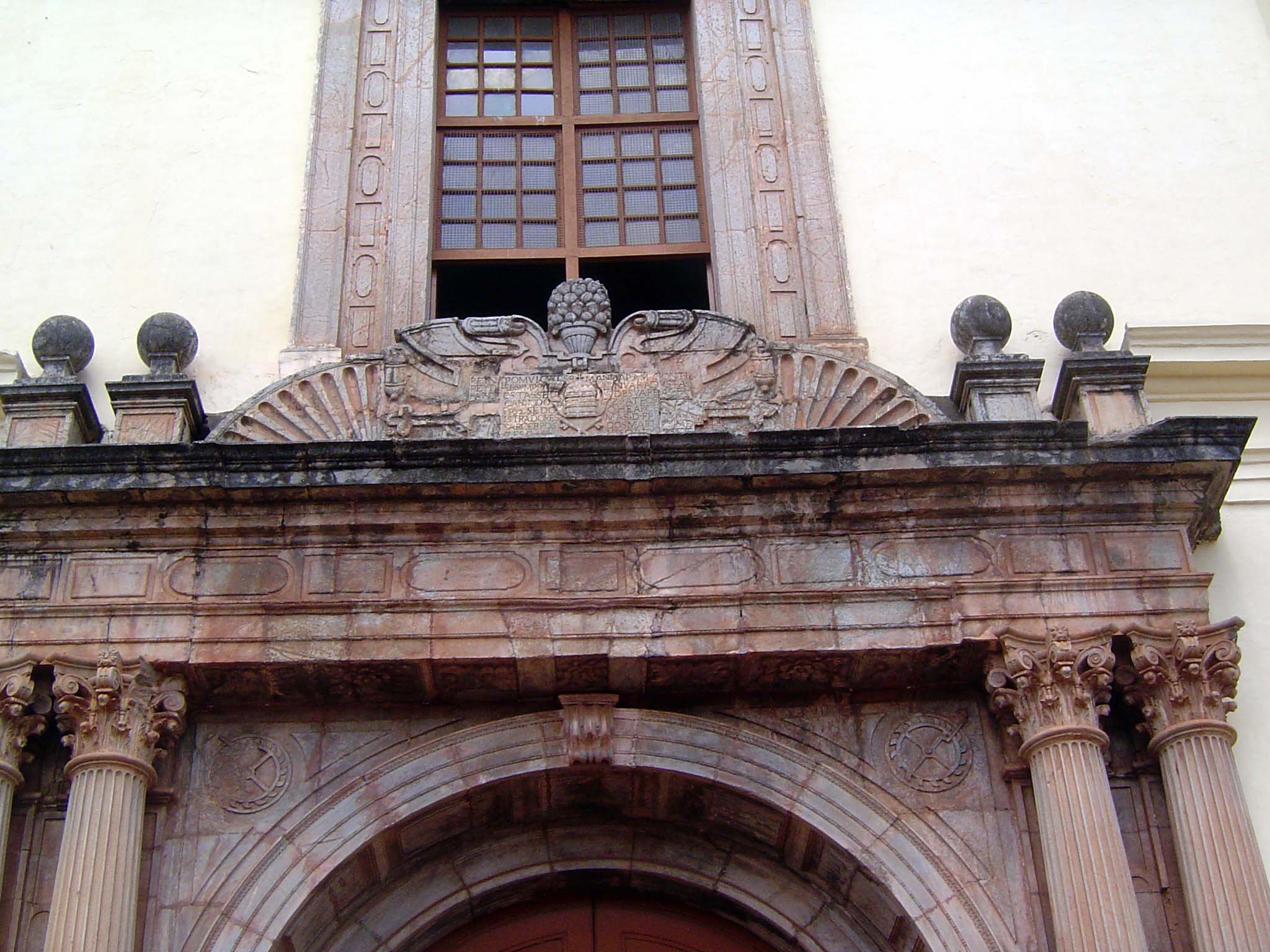 The inscription reads, "In the reign of the very catholic King Dom Sabastiao this cathedral was ordered to be erected... in the year of our