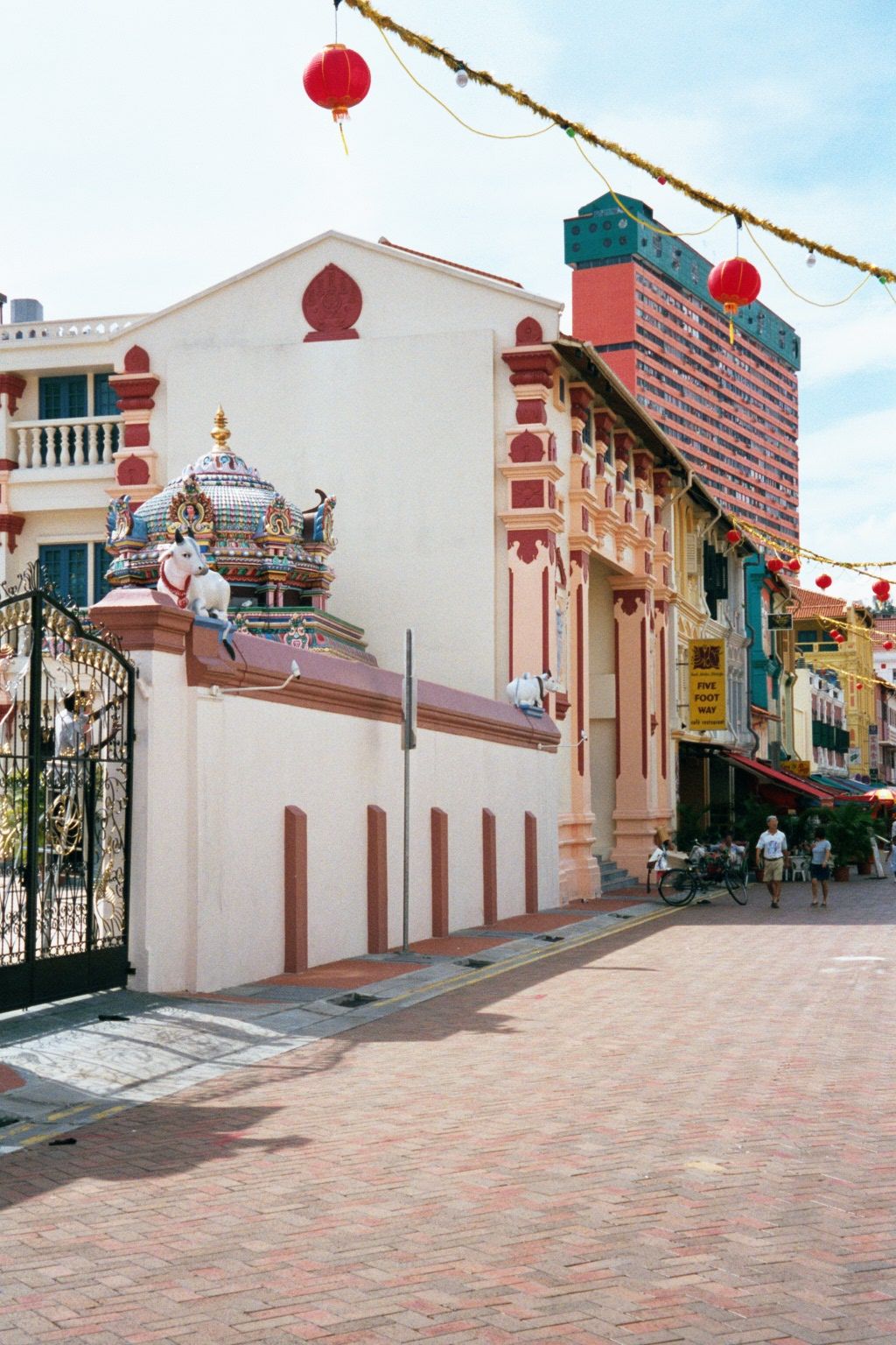 Enough of the English. Indians came to Singapore almost as early as Raffles. Here, the edge of their first temple Sri Mariamman, established