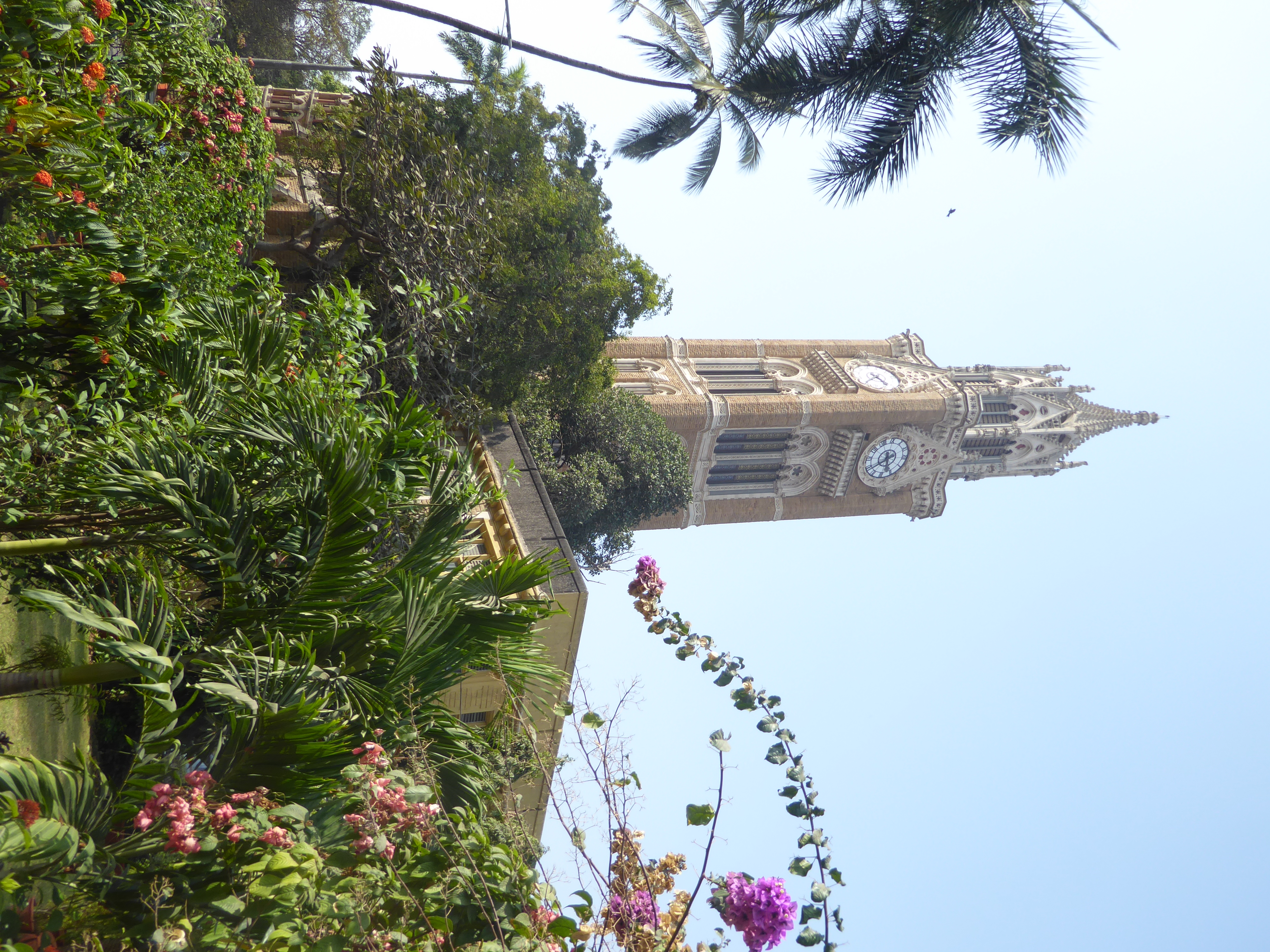 That tower you saw a minute ago belongs to the library of Bombay University.