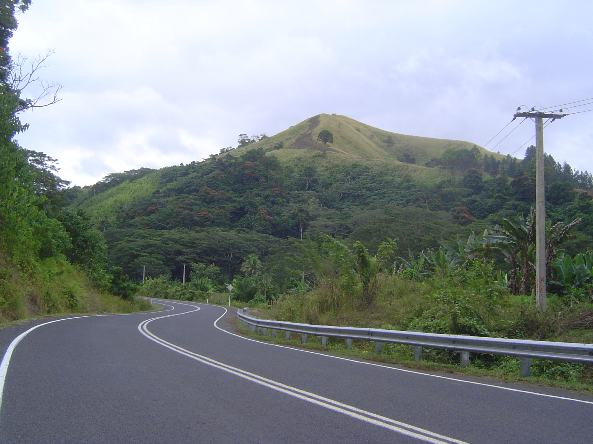 In Brewster's time, a circumferential road had finally been completed around the island, but there were no roads across the island. He hoped