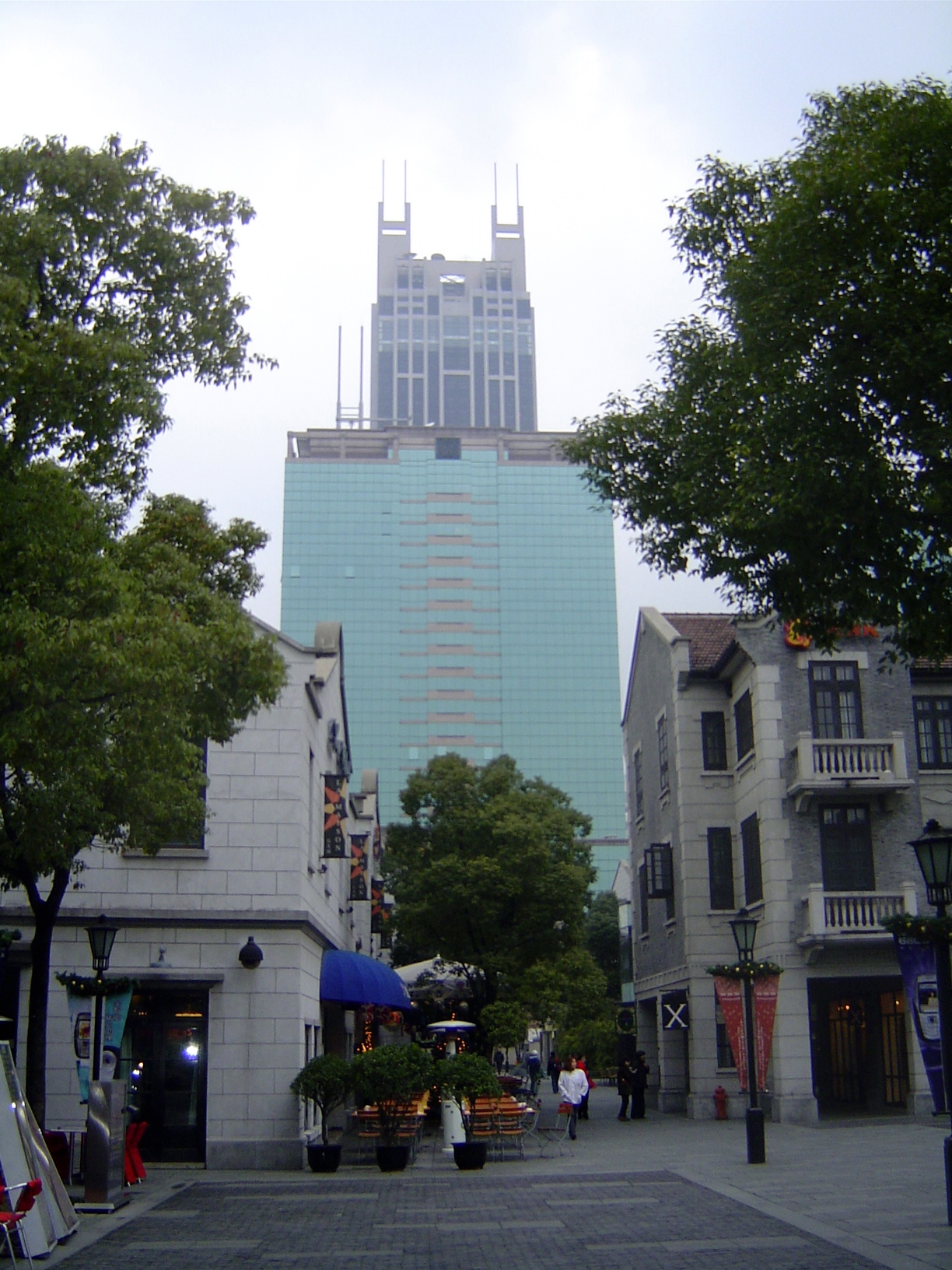 Juxtaposition: Xintiandi and the New World Tower.