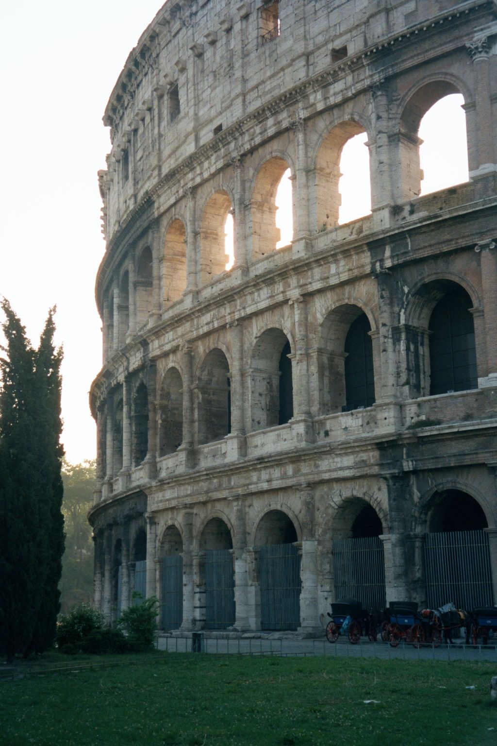 Sunrise at the Colosseum. The Flavian Amphitheater takes its popular name from a long-vanished statue of Nero as the sun god. This colossal