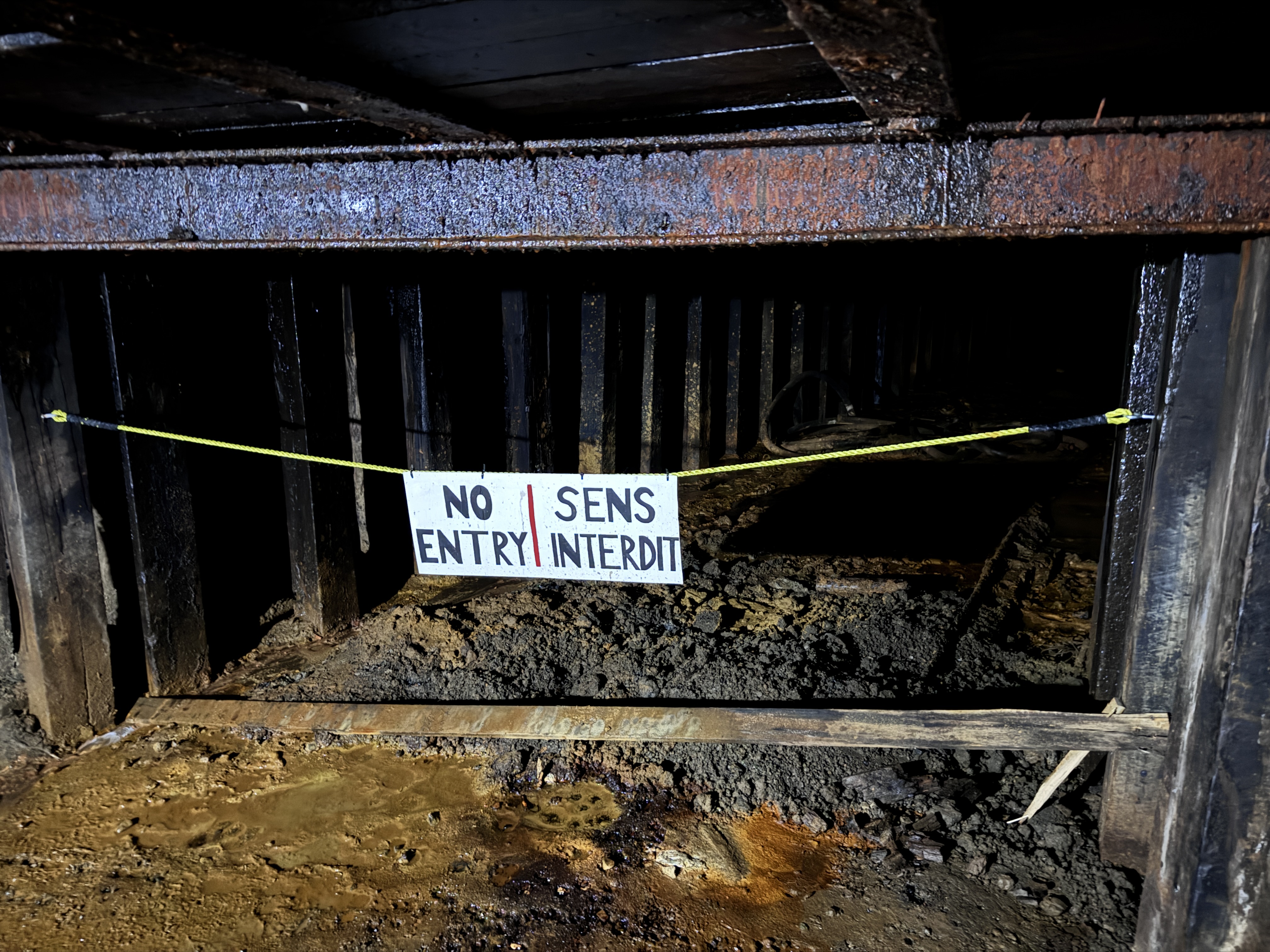 But the concrete quits, and soon you're in a tunnel whose roof is 66 inches above the floor--a number governed by the thickness of the coal