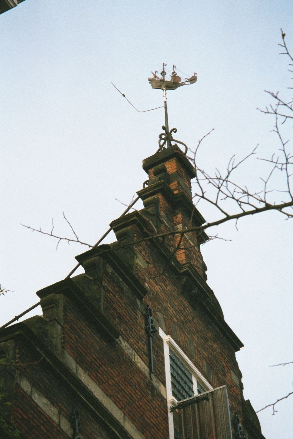 A similar gable, a similar venture, but the weathervane is an East India ship—and it doesn't deceive, because this is East India House.