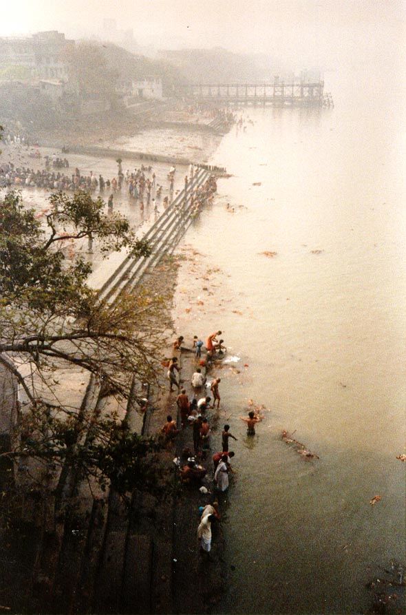 The view downstream from the city side of the bridge. The air is as murky as it looks; the water, more so. Murray's Guide from 1882 says tha
