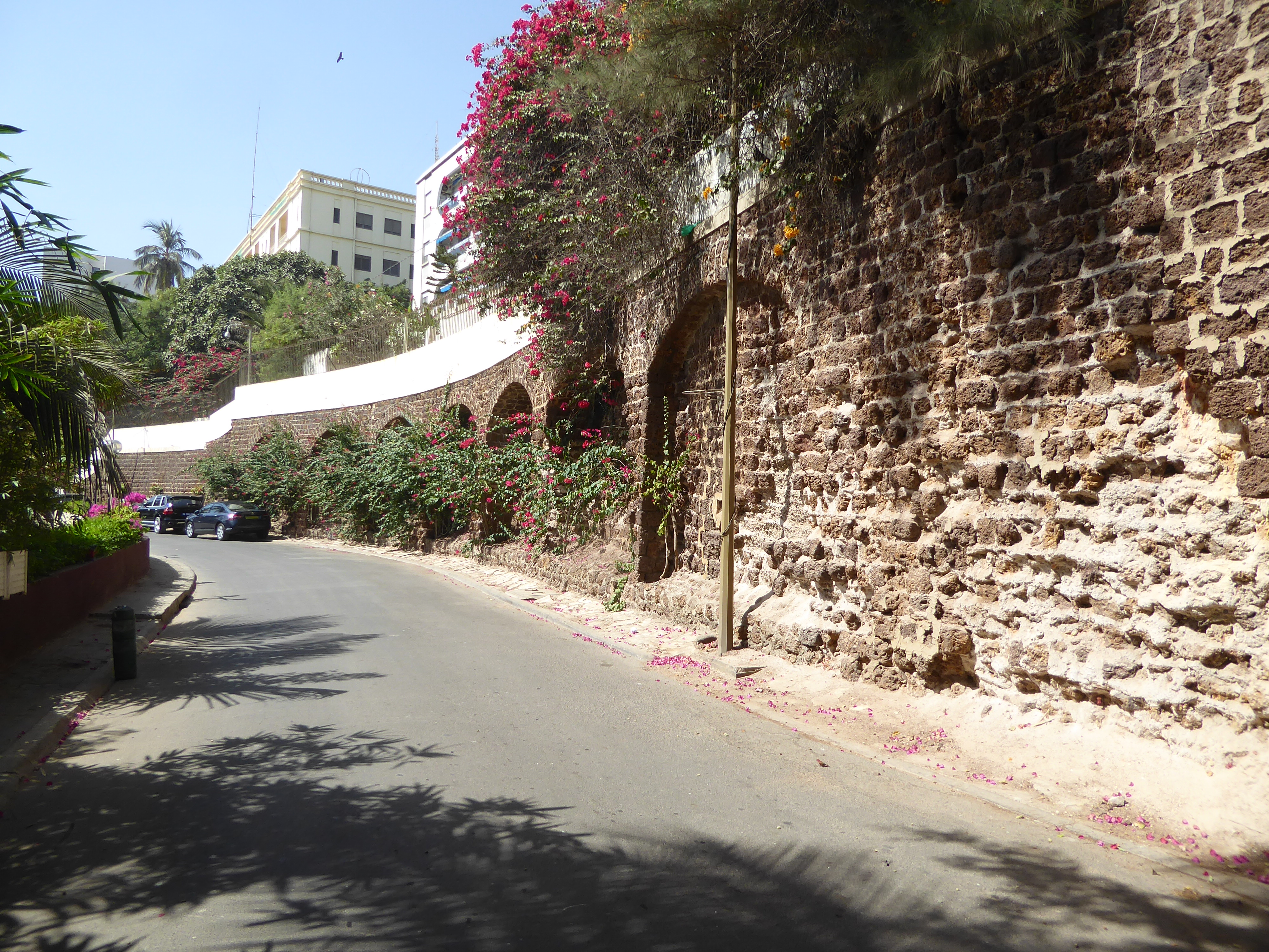 The beach was probably cleaner in years past. The road is the East Corniche.