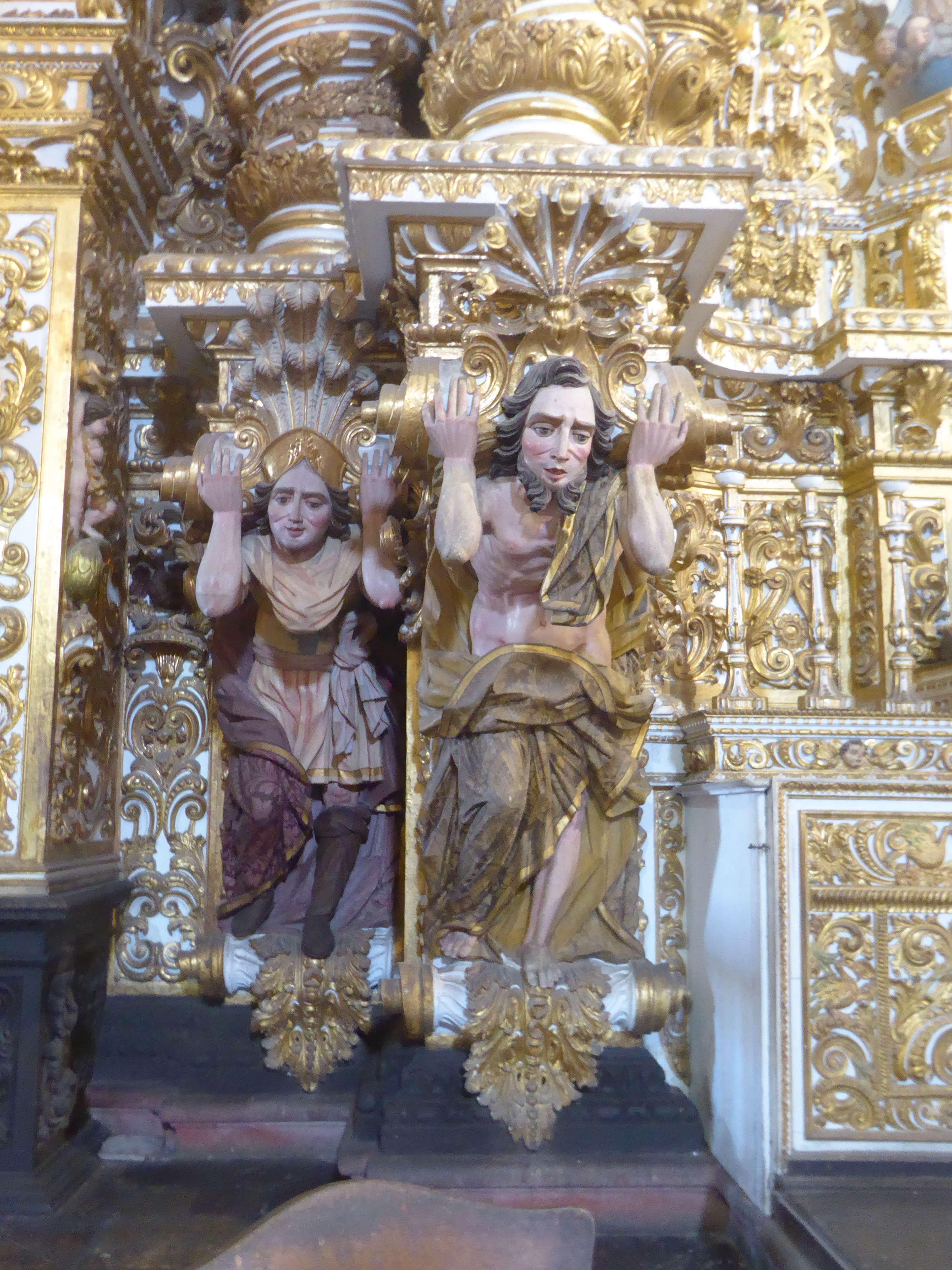 Do those telemons colossal male figures or atlantes represent historic figures? If so, who?