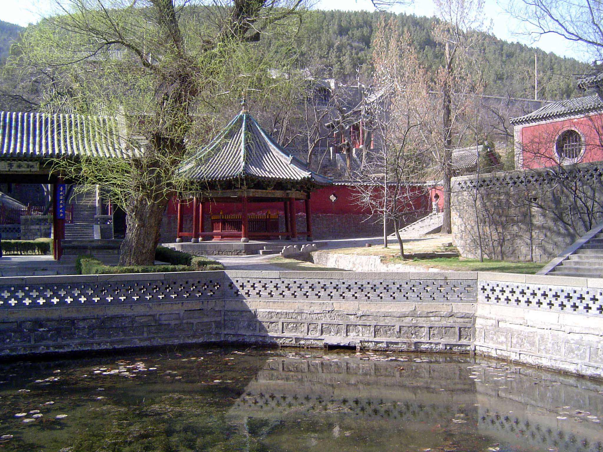 The kiosk in the distance stands over the Perfect Benefit Spring, whose water flows into the Octagonal Pool in the foreground. On the right
