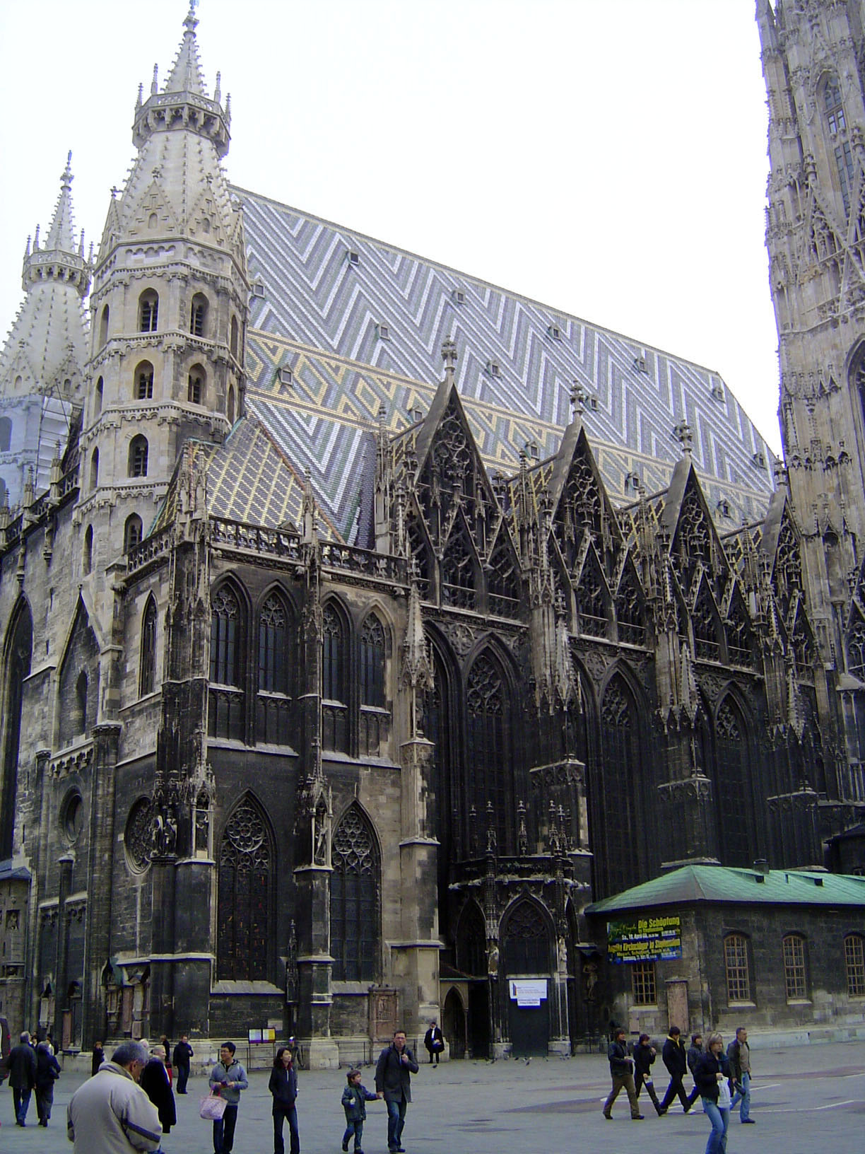 The main facade of St. Stephens was finished about 1230, but these things are hardly ever really finished, and the four decorative gables on