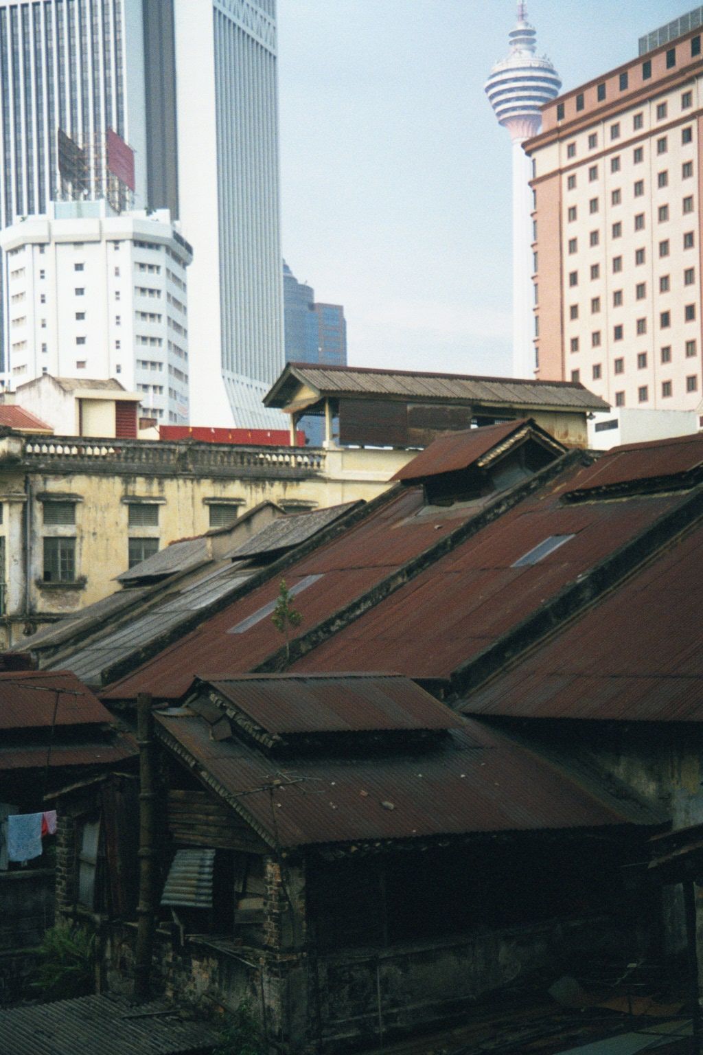 A new city rises behind Chinatown.