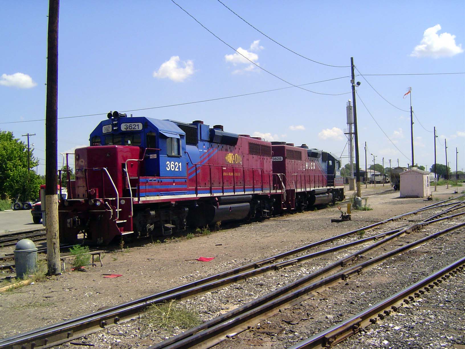 The locos read Kansas and Oklahoma—odd name for a railroad that operates from Wichita west to the Colorado Line. It's owner, WATCO, also ope