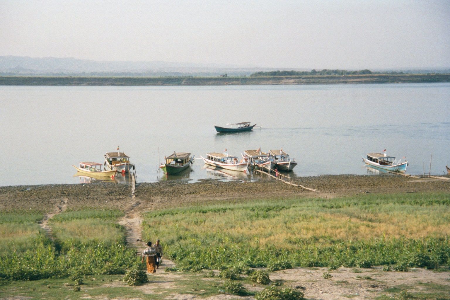 Along its banks, farmers grow crops with residual moisture and, as needed, with tiny gasoline pumps that lift river water.