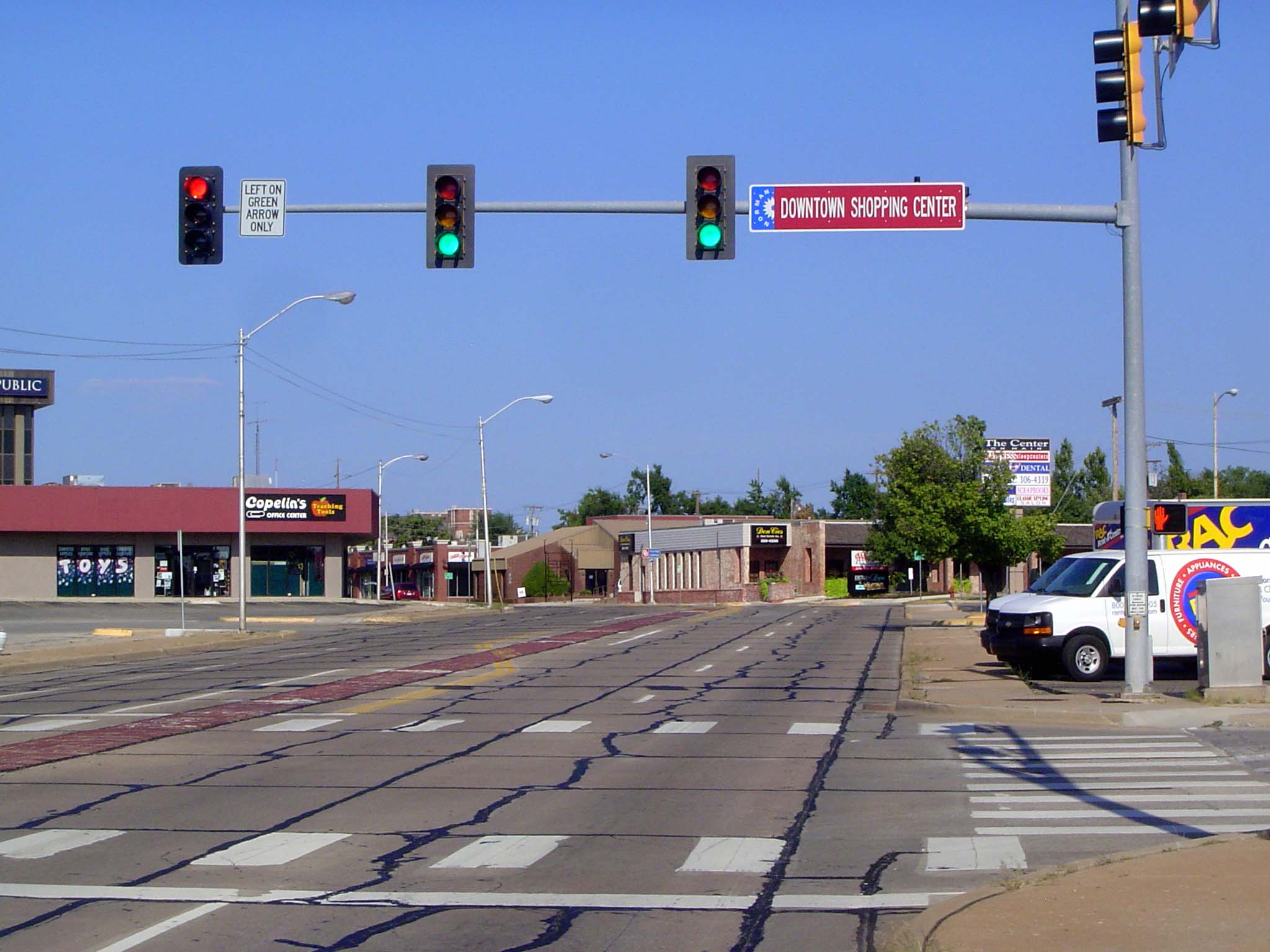 Main Street makes a 45-degree bend as it corrects from the original townsite grid in the background to an east-west alignment. The town's fi