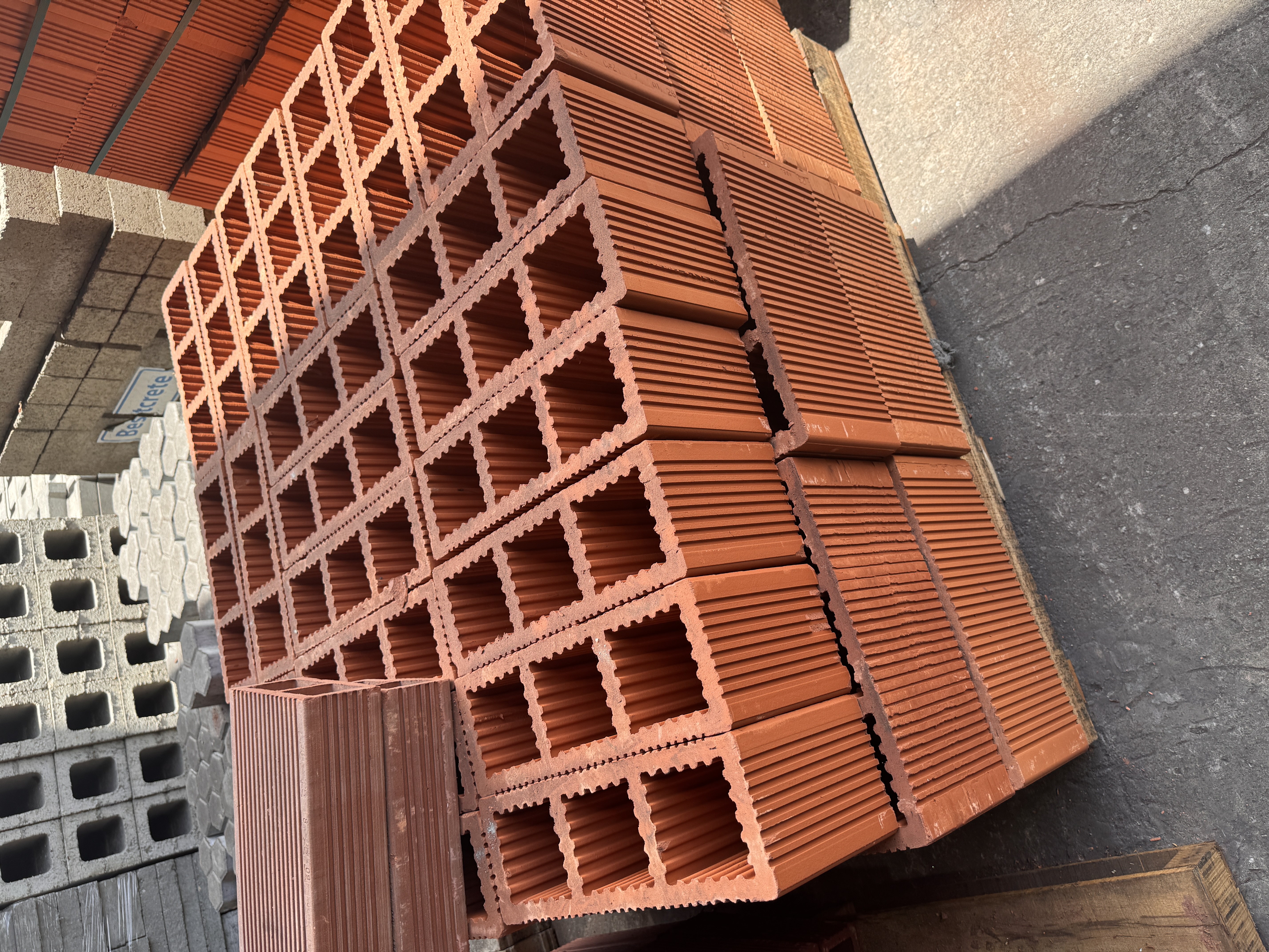 Trinidad's housing sector today relies not on wood but on red blocks, also called clay blocks, here stacked at Bhagwansingh's Superstore nea