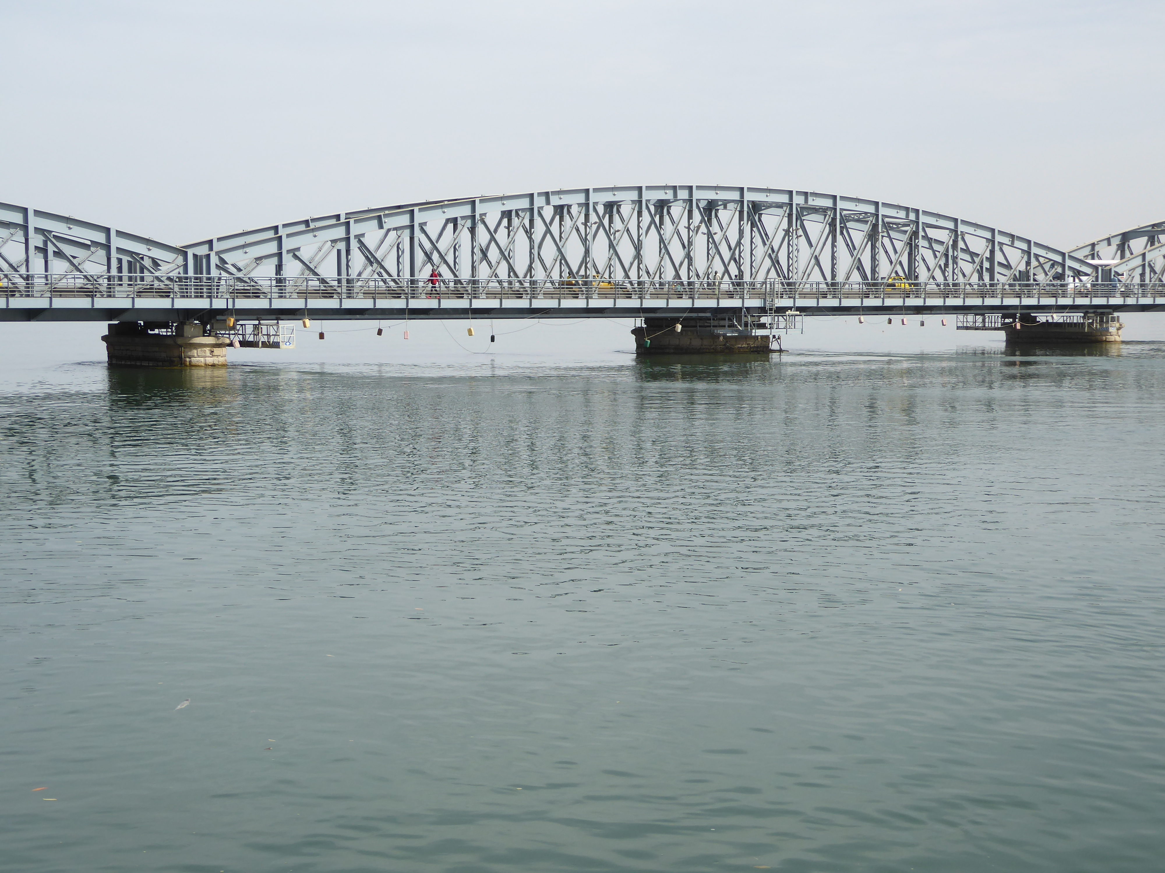 In case you're running how the ship got past the Pont Faiderbe, here's the answer: one of the seven spans pivots at the middle. It opened in