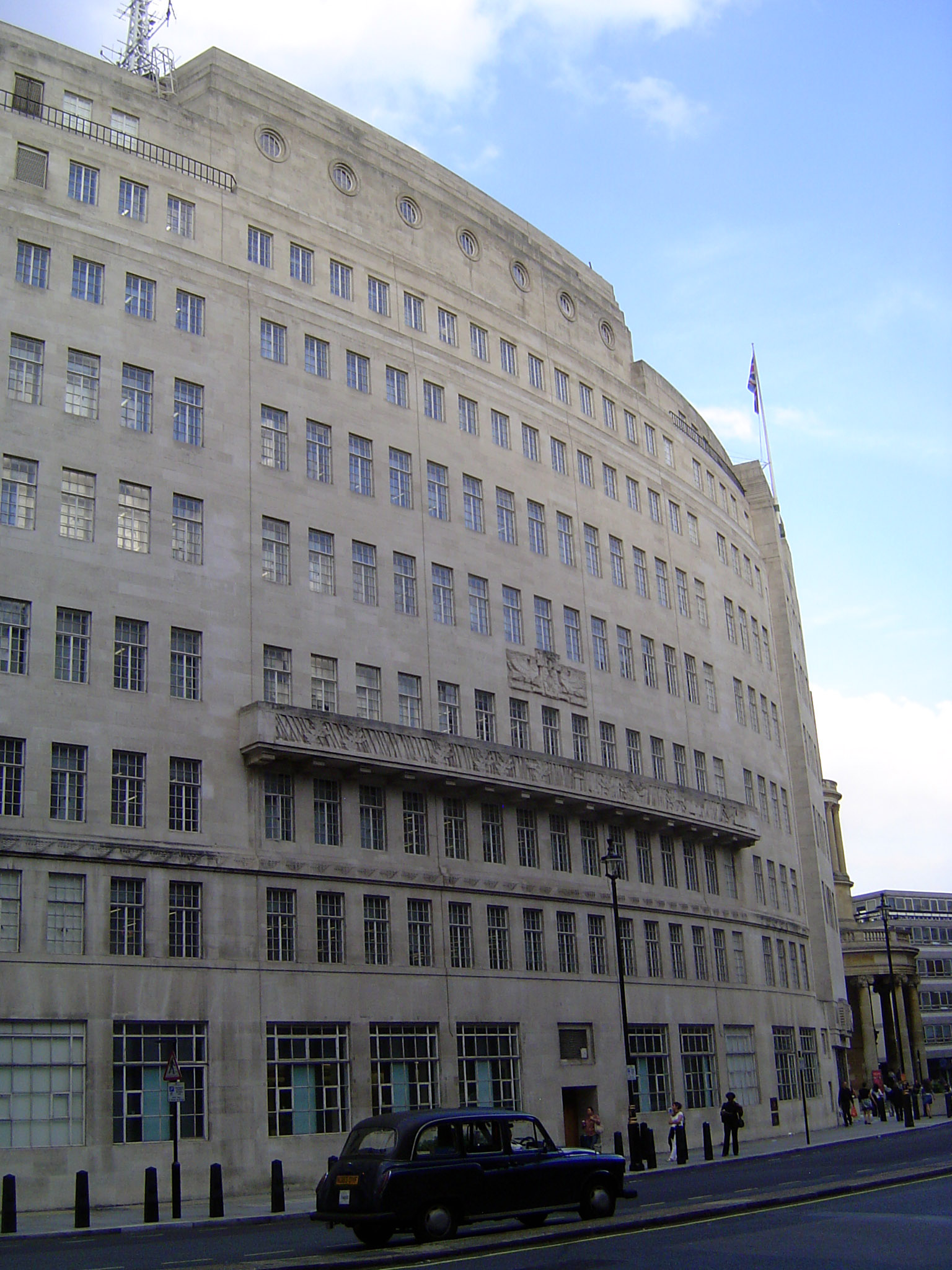 Pevsner is unkind to the architect, George Val Myer, calling the building "lumpily neutral" 3:74. The Architectural Review was much more ent
