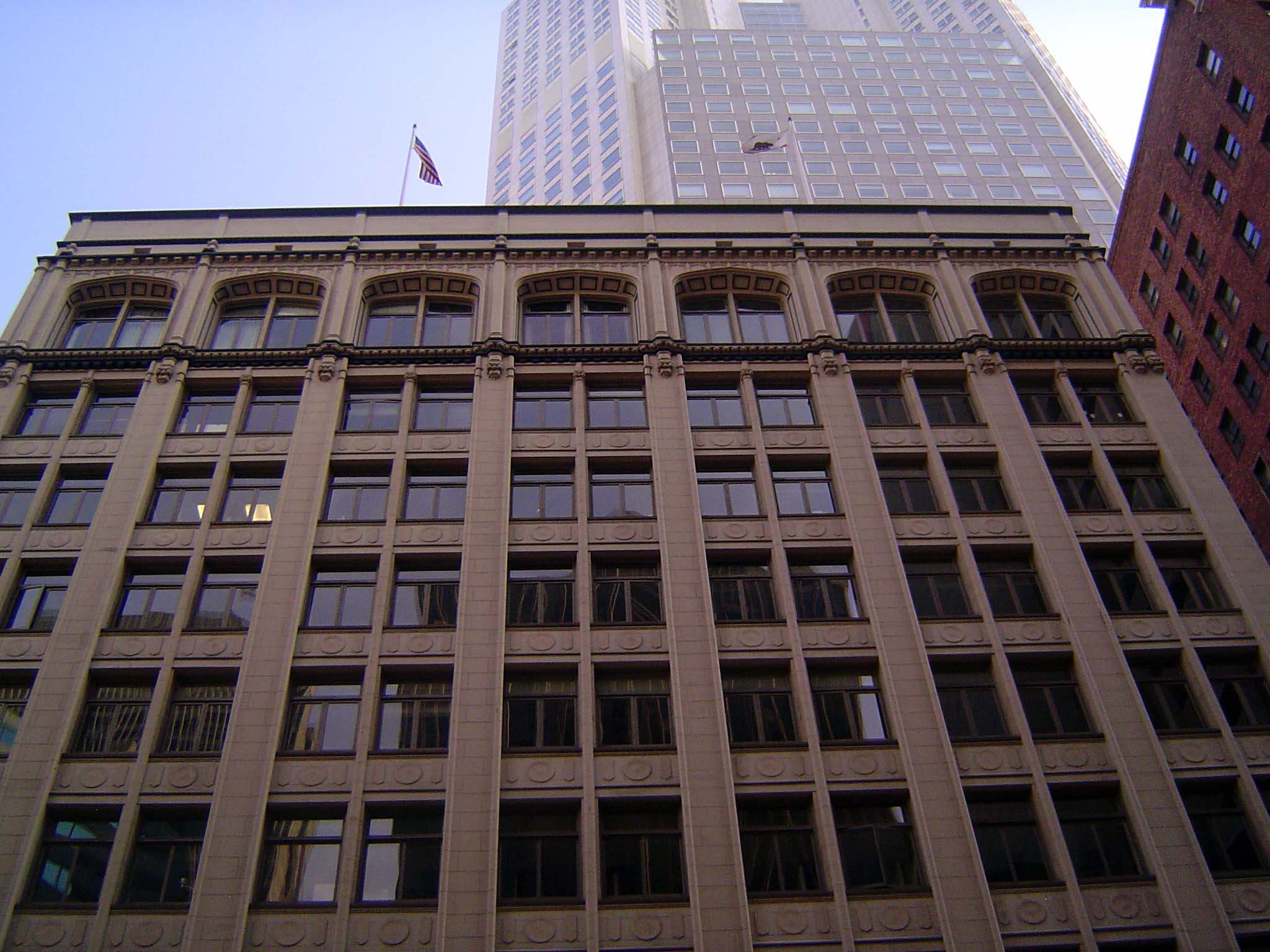 The building has lost its cornice.