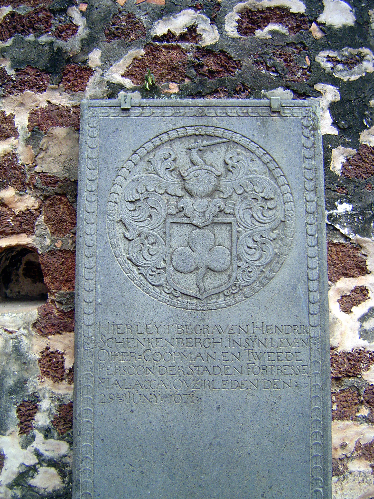 One reads: "Here lies buried Hendrik Schenkenbergh, in his life head merchant and the second person of the fortress city Malacca. Died 29 Ju