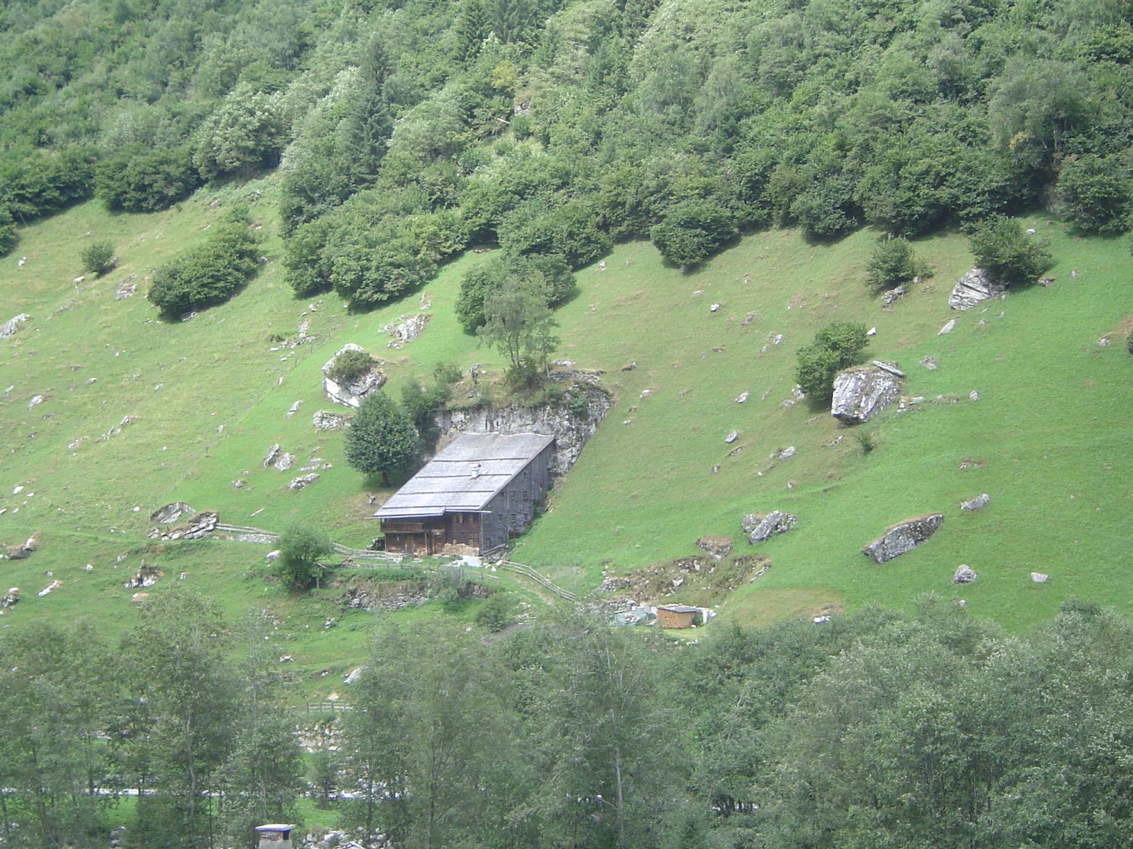 Downstream, another defensive measure against landslides.