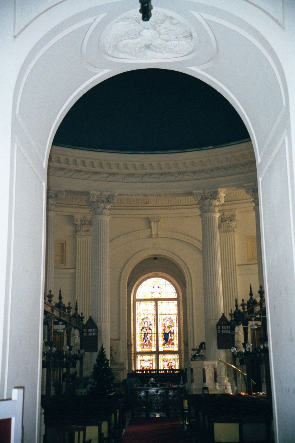 From the main entrance. A dark-blue dome rises over the nave.