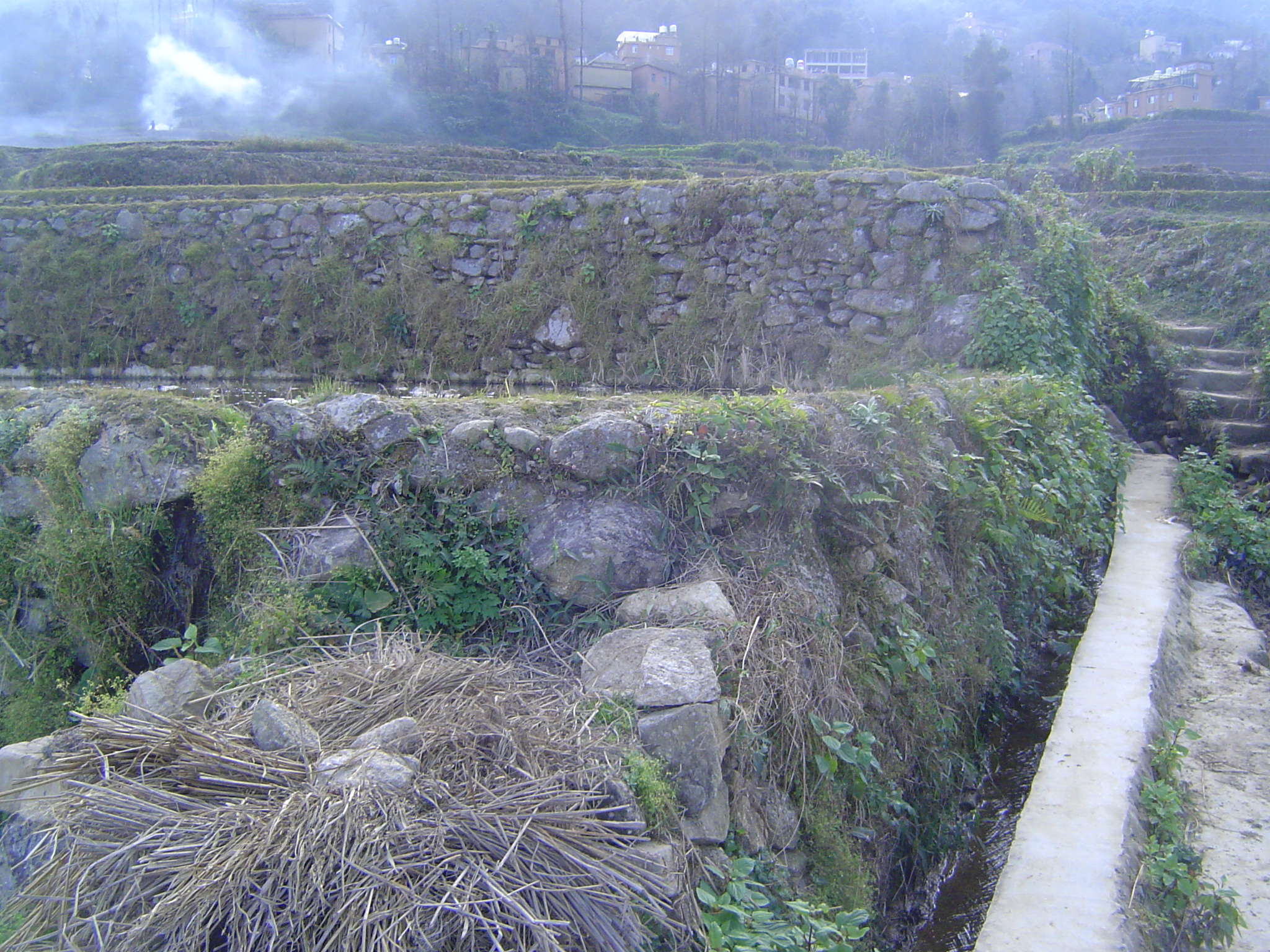The view back. The wall in the middle distance must be seven feet high above the water.