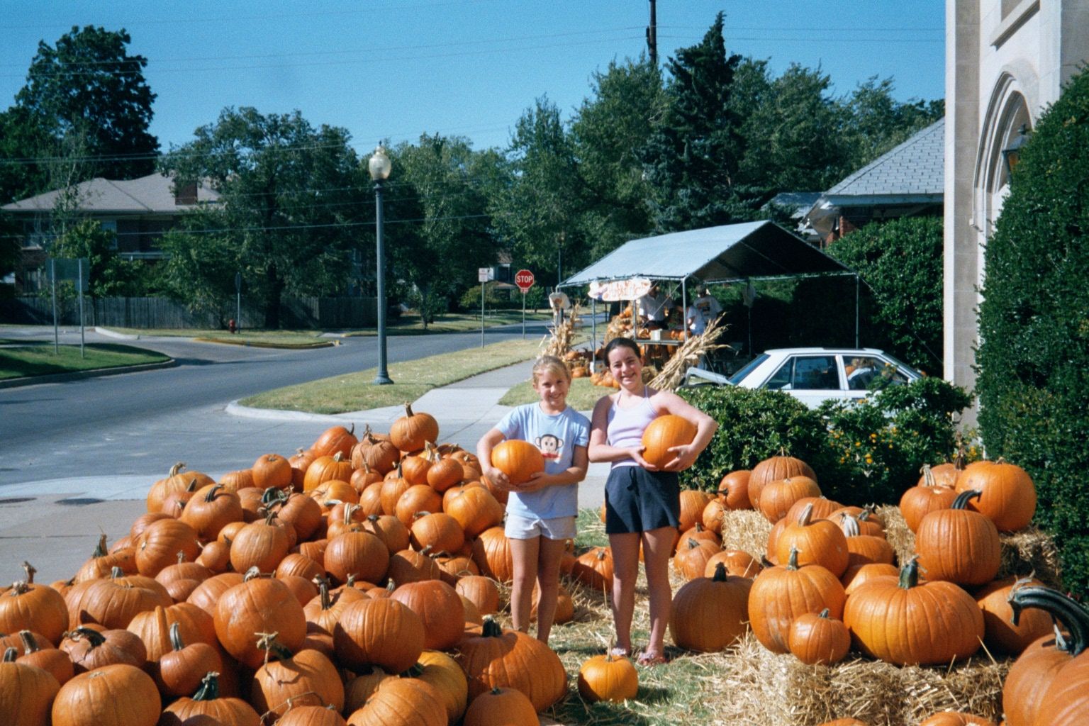 Pure Americana: every year, the McFarlin Methodist church imports a mess of pumpkins from New Mexico. They aren't cheap, but what are you go
