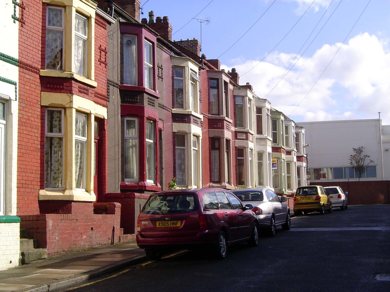 One bay for the door and the other for a bay window. Such houses are available for about 100,000 pounds, unless they're in need of renovatin