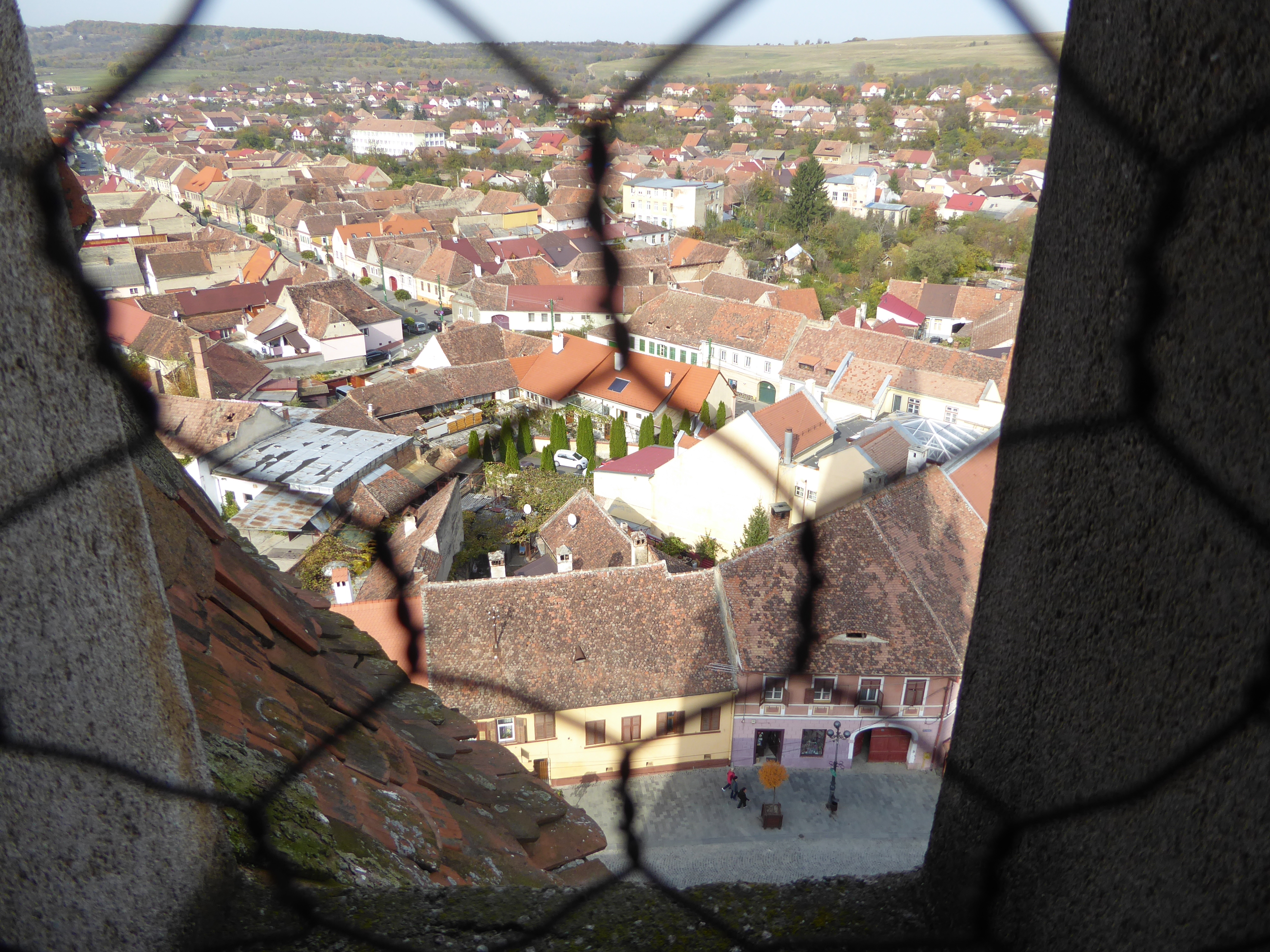 Pity about the chickenwire, but you get a good sense of the clay tiles as well as of the linearity of town streets. We'll see more of that,