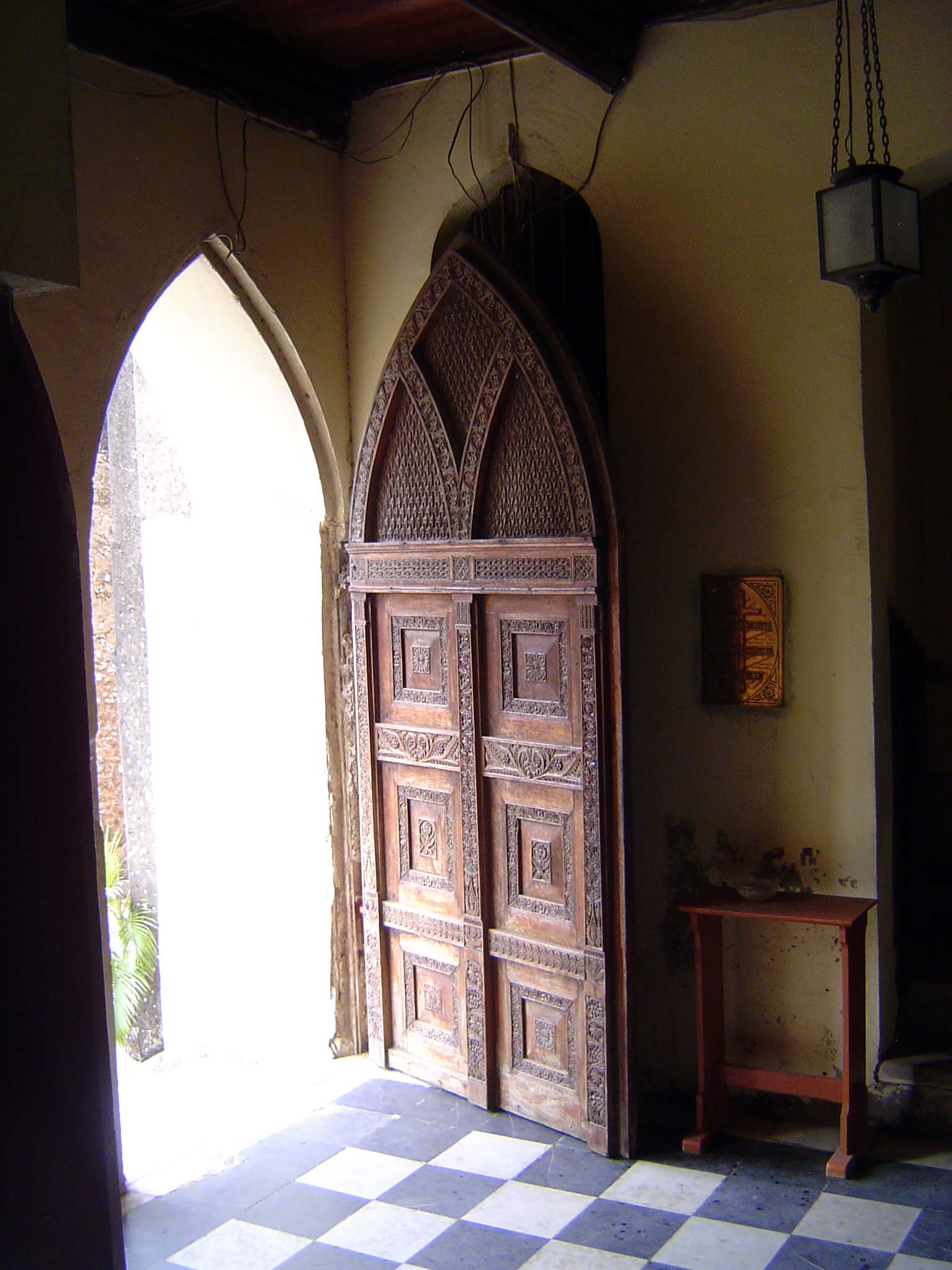 The entry has a typical Zanzibari door, though nodding to the Gothic. The true Omani door would have a flat lintel.