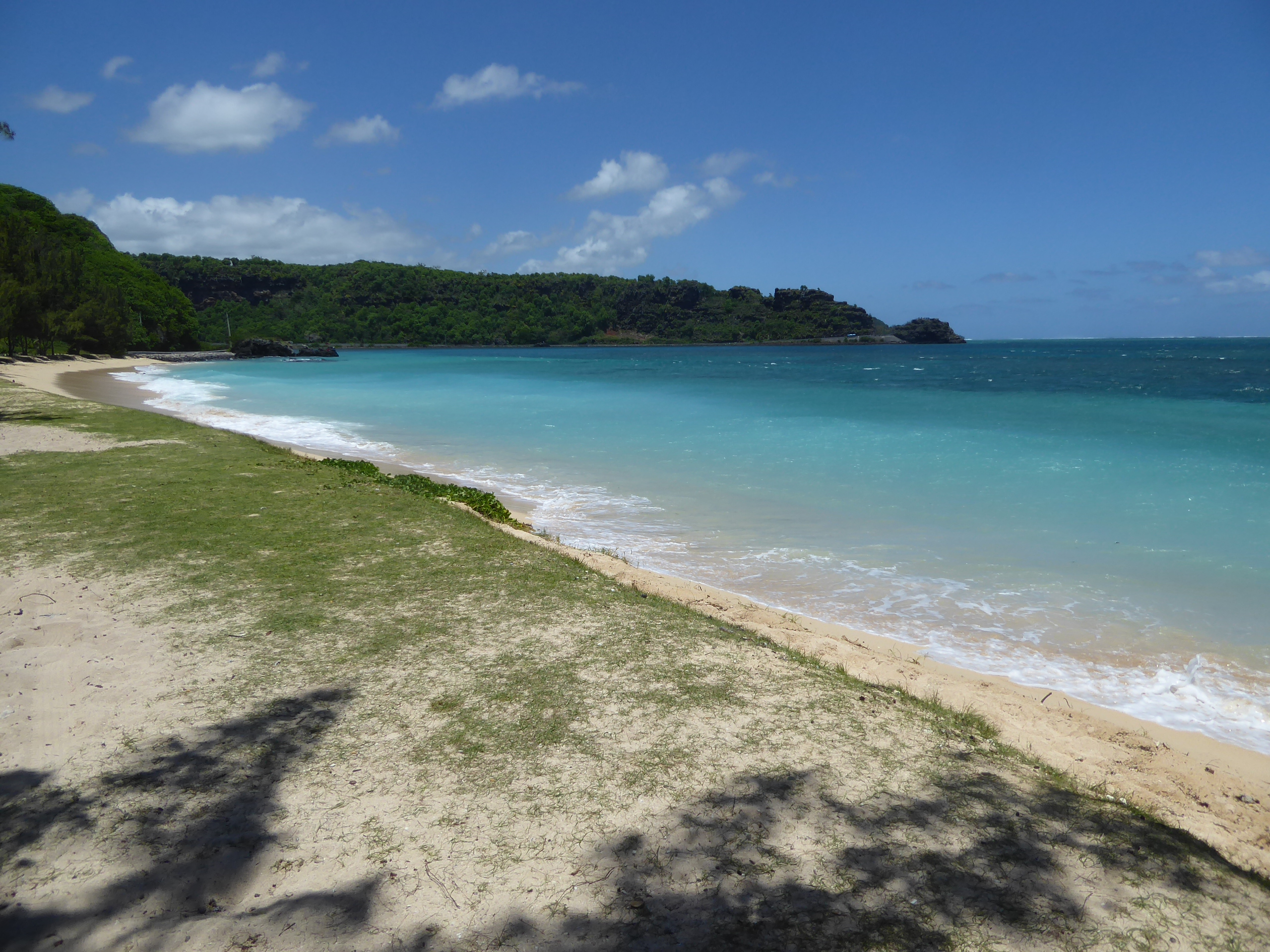 But that's not why we're here. We're looking for places to loll. See how calm the water is? You can just make out the protective coral reef