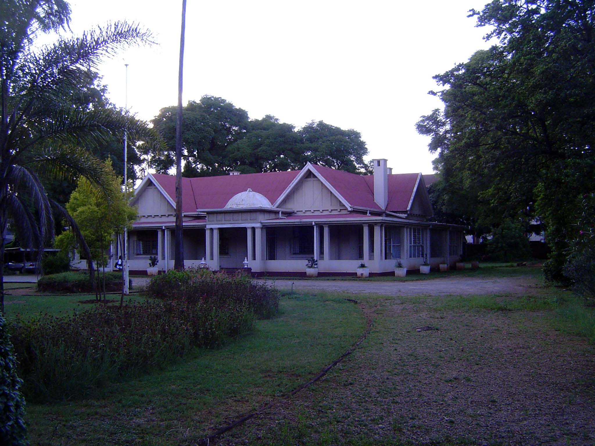 Another house, big but still with a corrugated-iron roof.