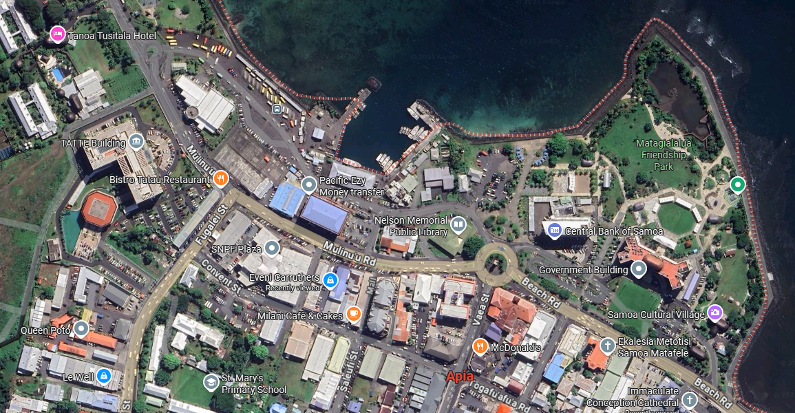 That hotel appears here at the upper left corner.  The green triangle projecting into the sea is reclaimed land, separating Beach Road from