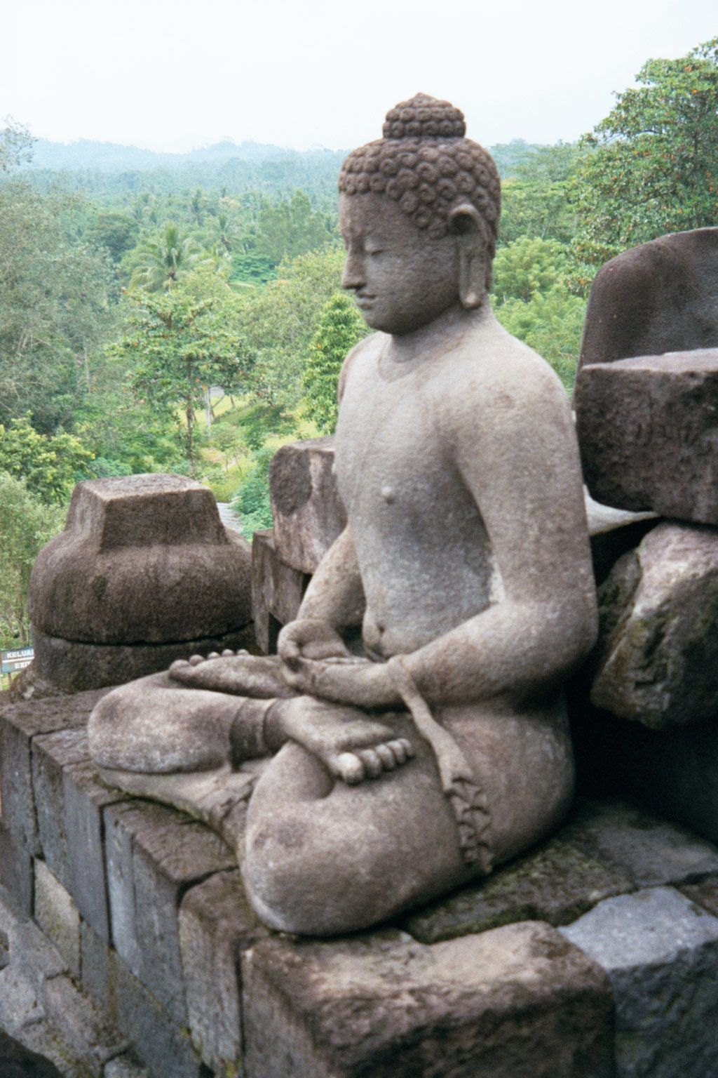 Walking around the terraces, you can even suddenly feel that there's somebody next to you. In this case, it's a Buddha in the dhyanamudra, s