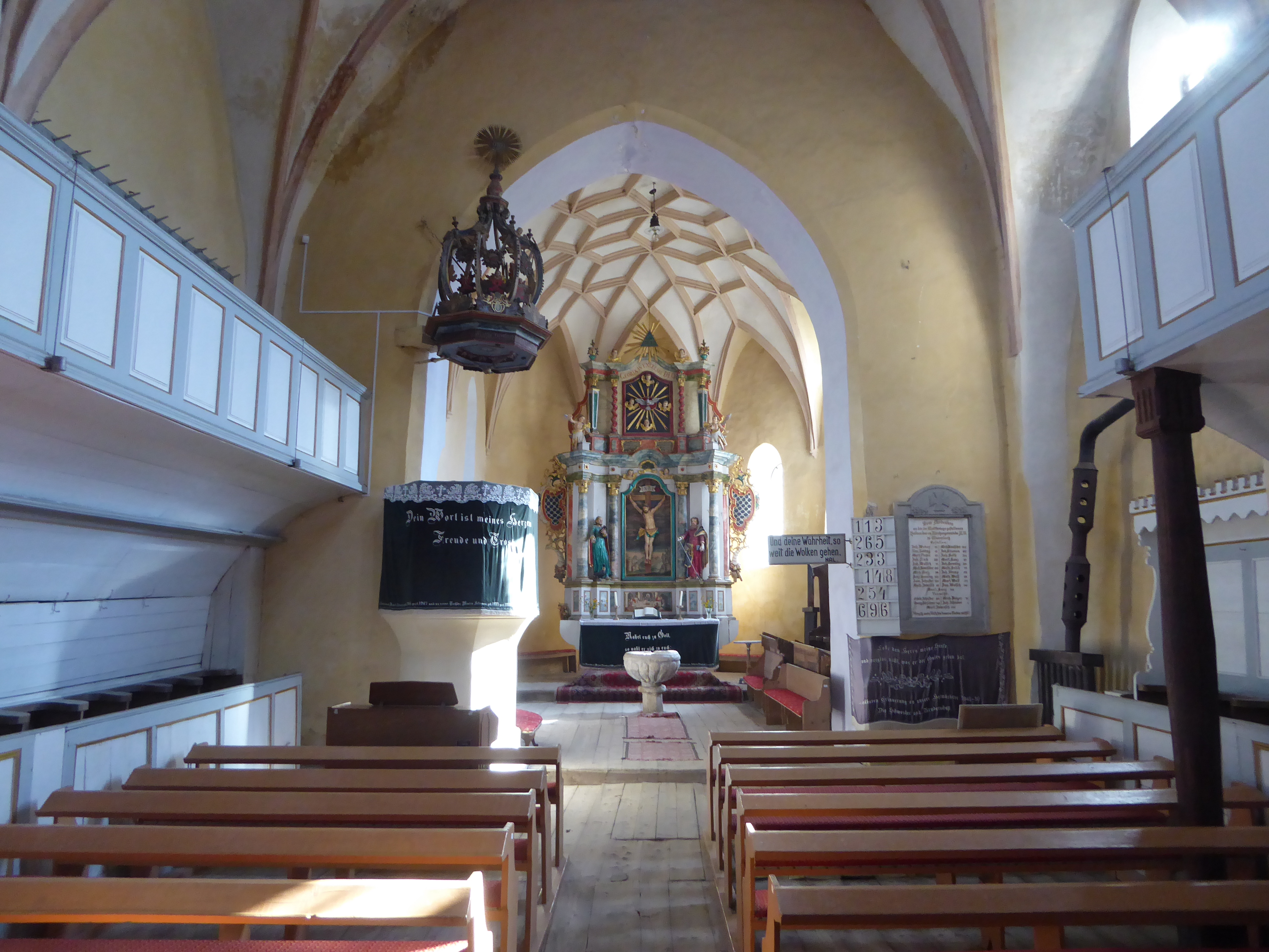 The church interior is simple, except for the altar, added about 1779 by a craftsman from Sighisoara.