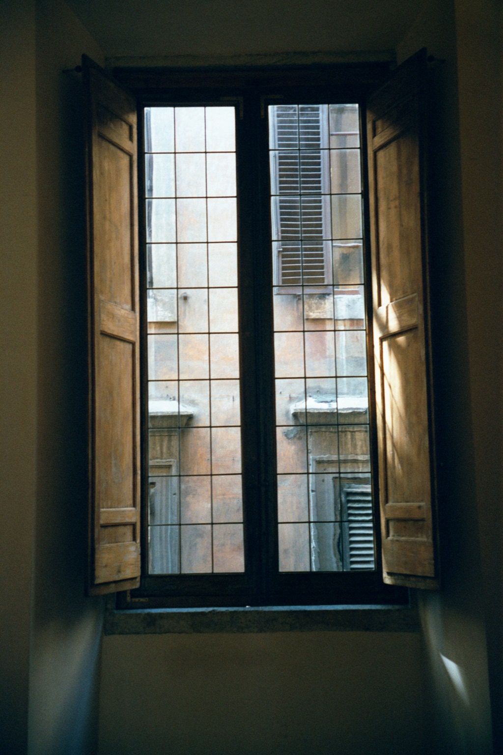 A street-side window, upstairs near Room 33.