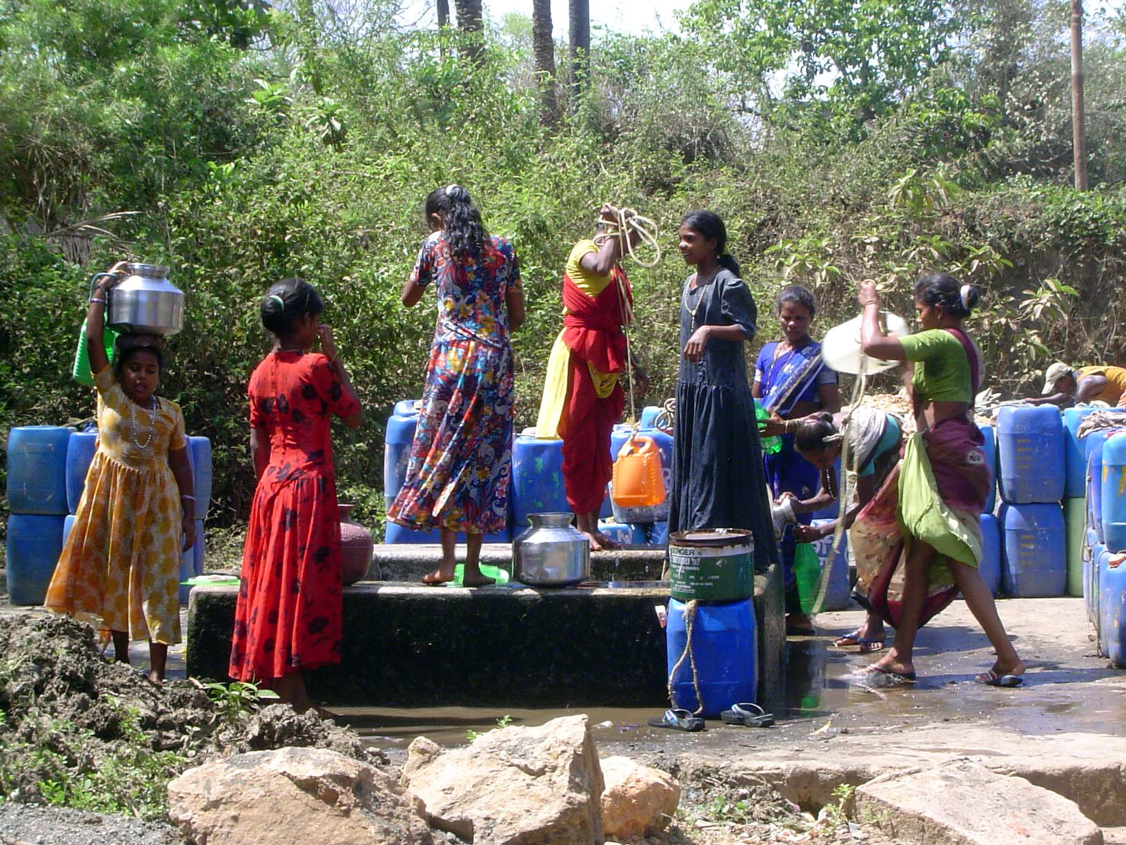 Villagers enter the fort to use the old wells.